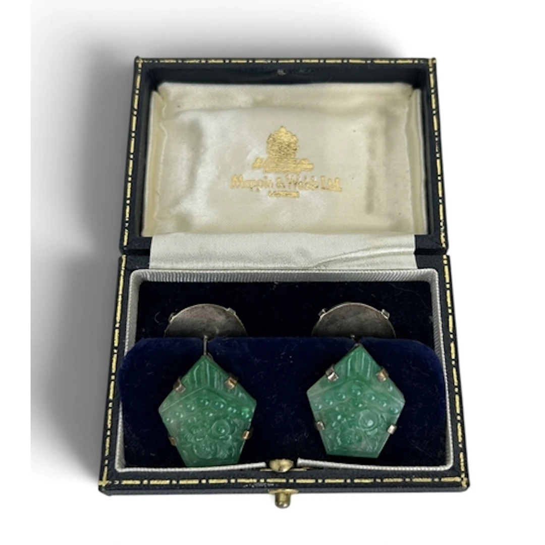 A PAIR OF CHINESE SILVER AND CARVED JADEITE CUFFLINKS Widest...