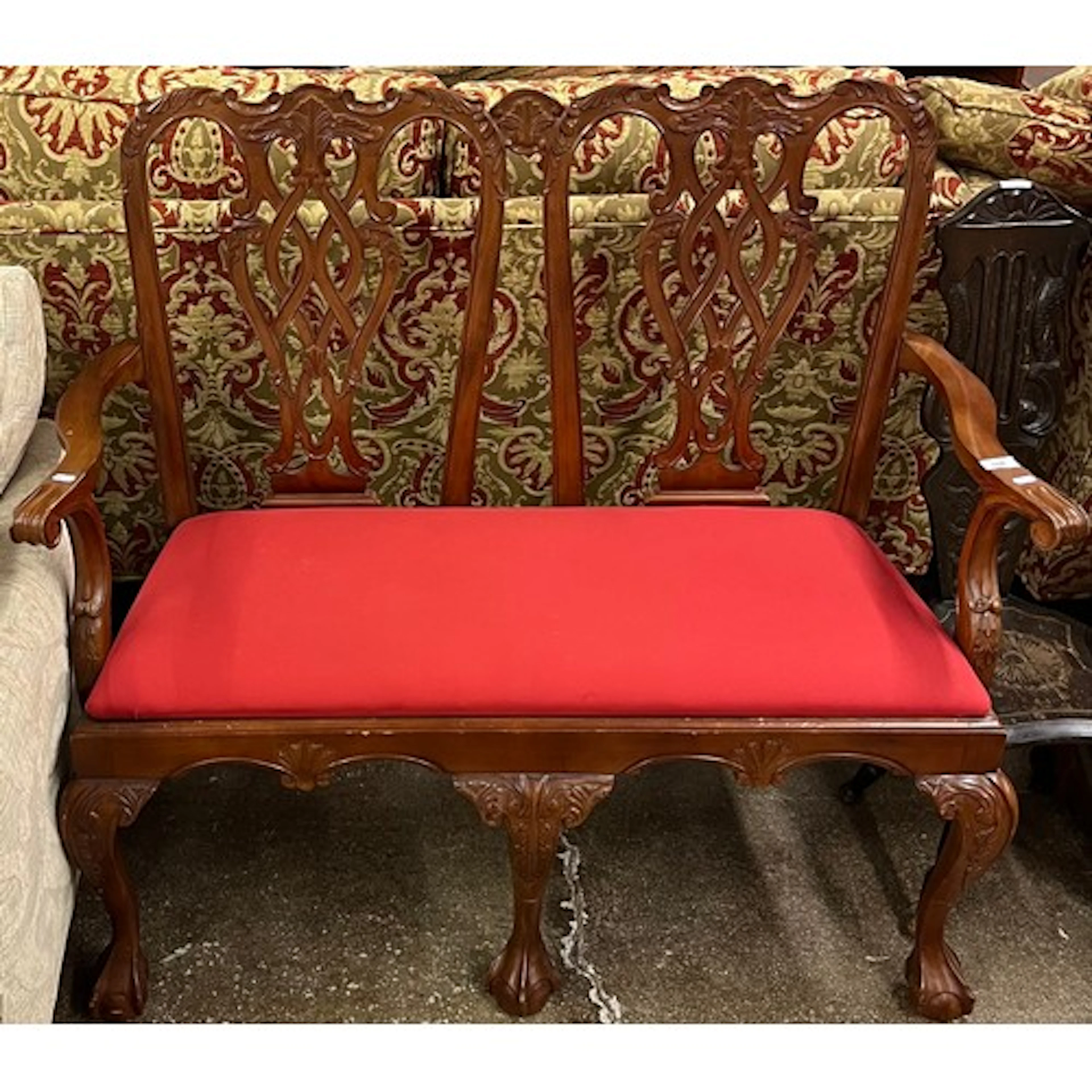 Chippendale style two seat sofa on cabriole support.