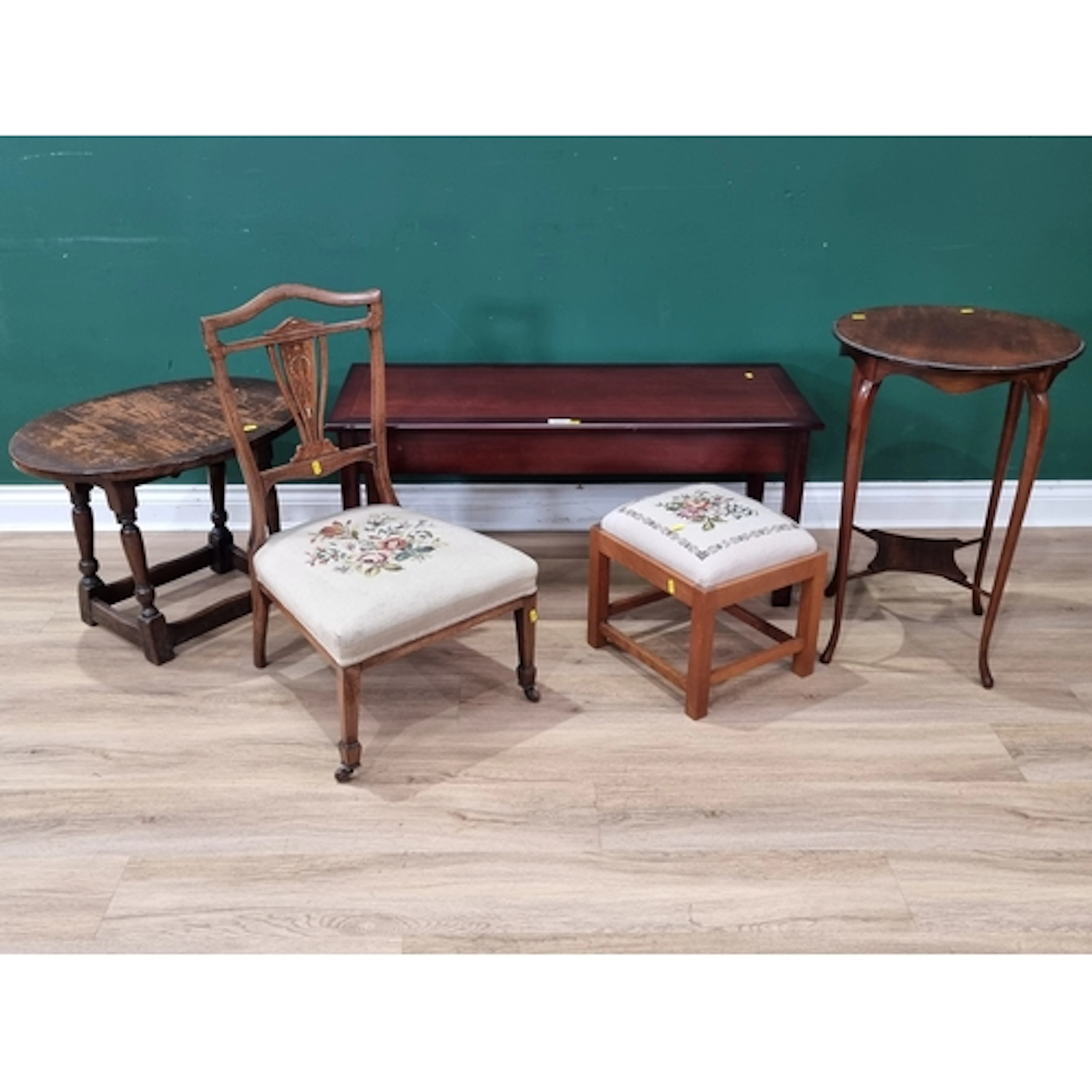 A reproduction coffee Table, a small oak drop leaf Table, a ...