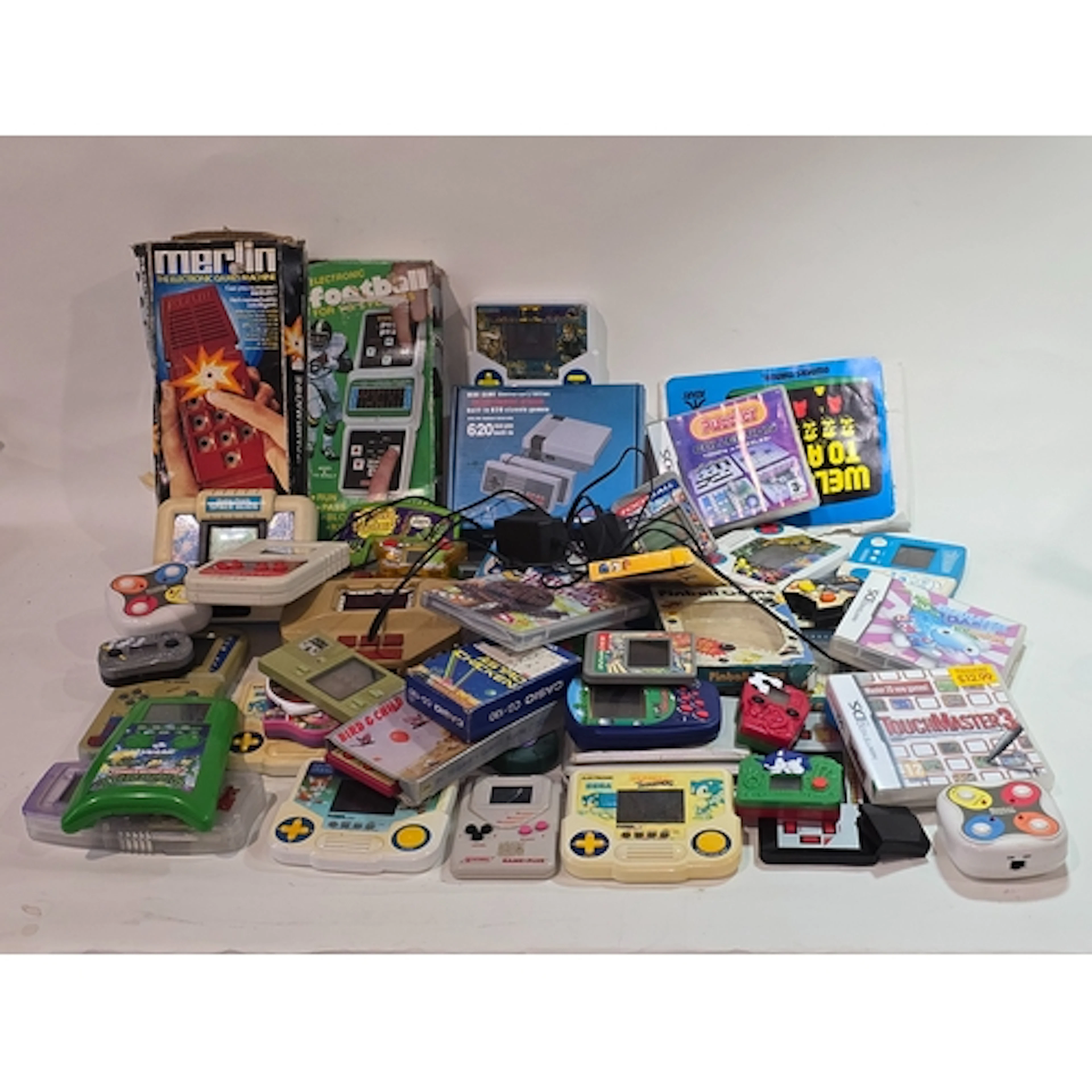 Large collection of mostly vintage handheld electronic games...