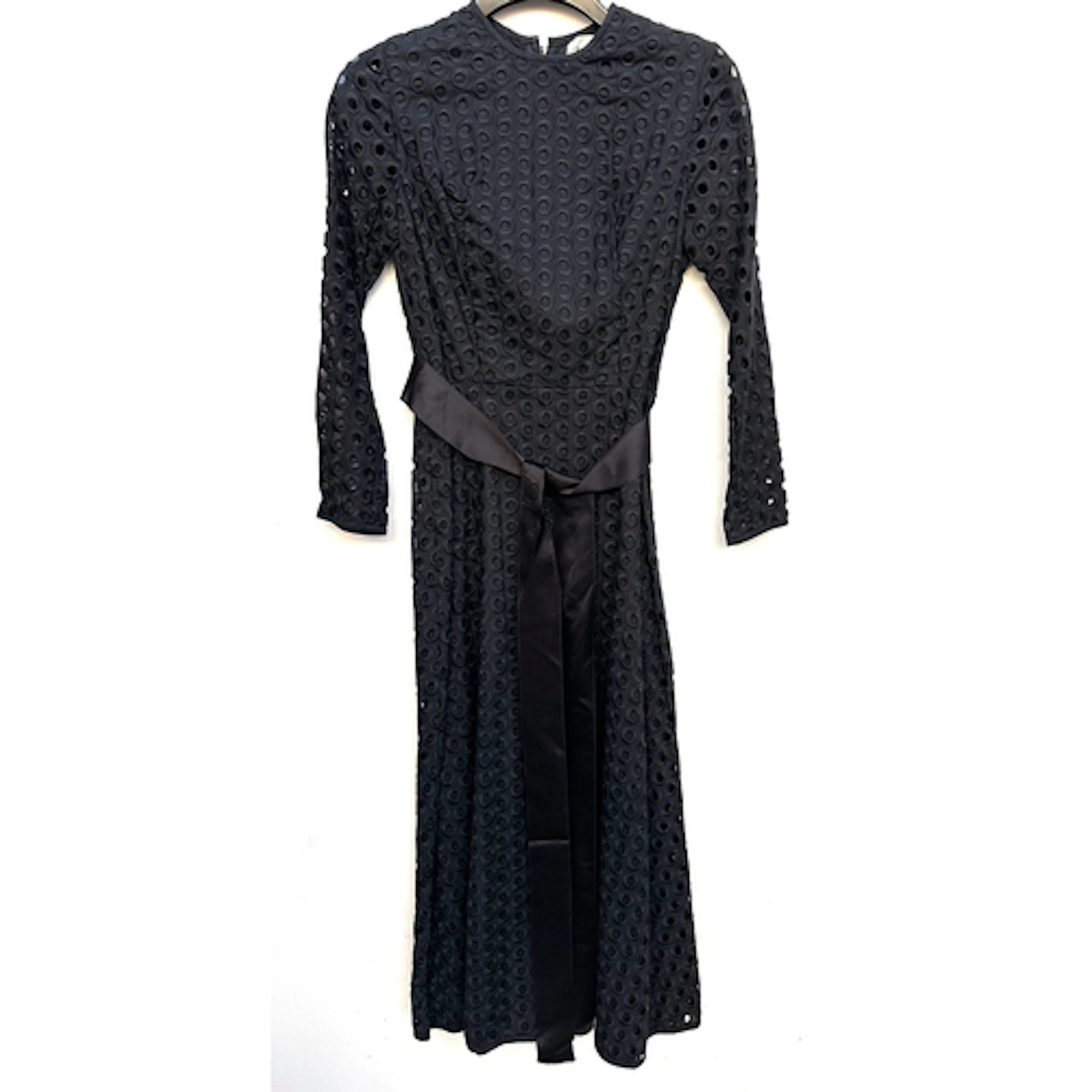A black full length dress by Marcel Ferez, designed by Rolan...