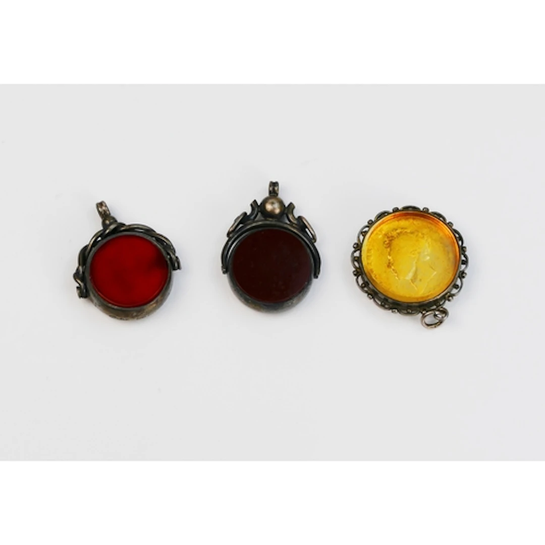 Three silver mounted fobs, two set with carnelian and bloods...