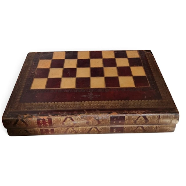 A 19th Century double sided folding Games Board designed as ...