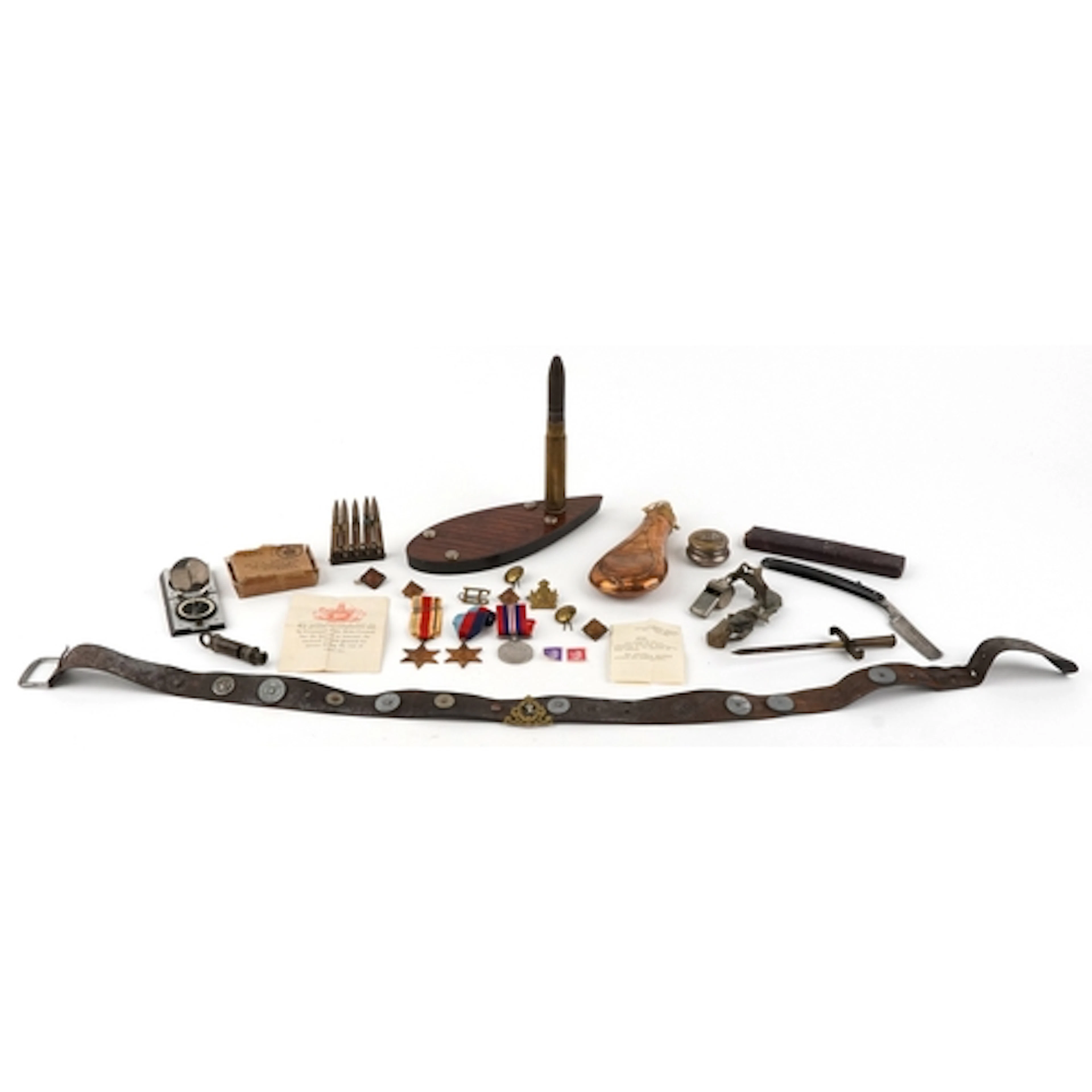 British militaria and trench art including a shell case tabl...