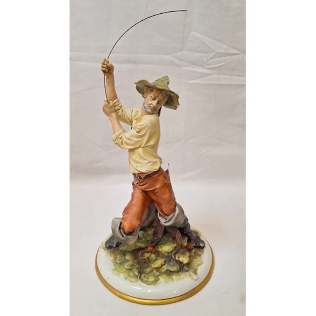 Capodimonte Figurine Fisherman entitled 'Tosca The Angler' w...