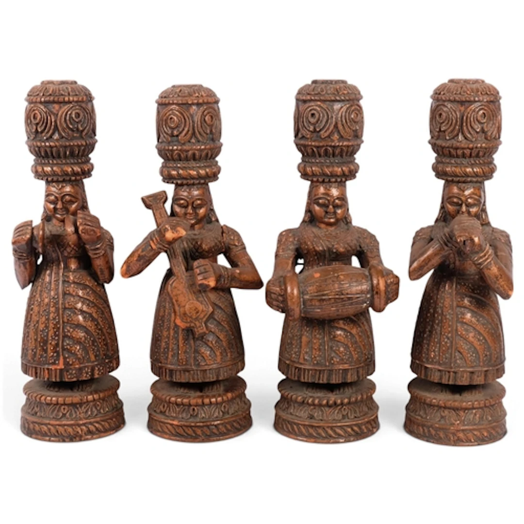 A set of 4 Indian carved and painted wood Apsara musicians, ...