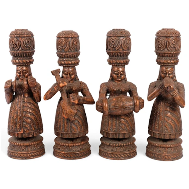 A set of 4 Indian carved and painted wood Apsara musicians, ...