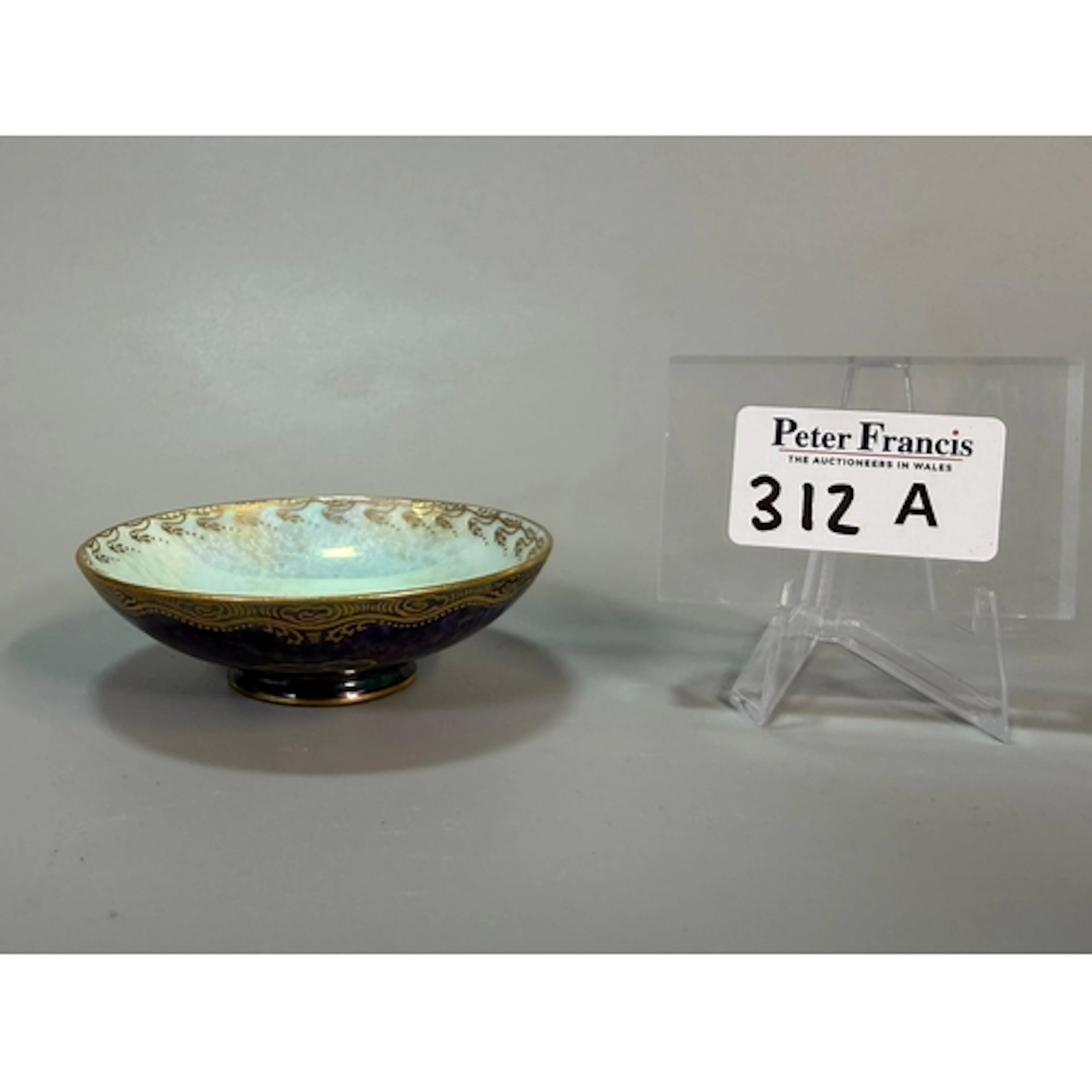 Wedgwood Fairyland Lustre bowl depicting stylised bird motif...