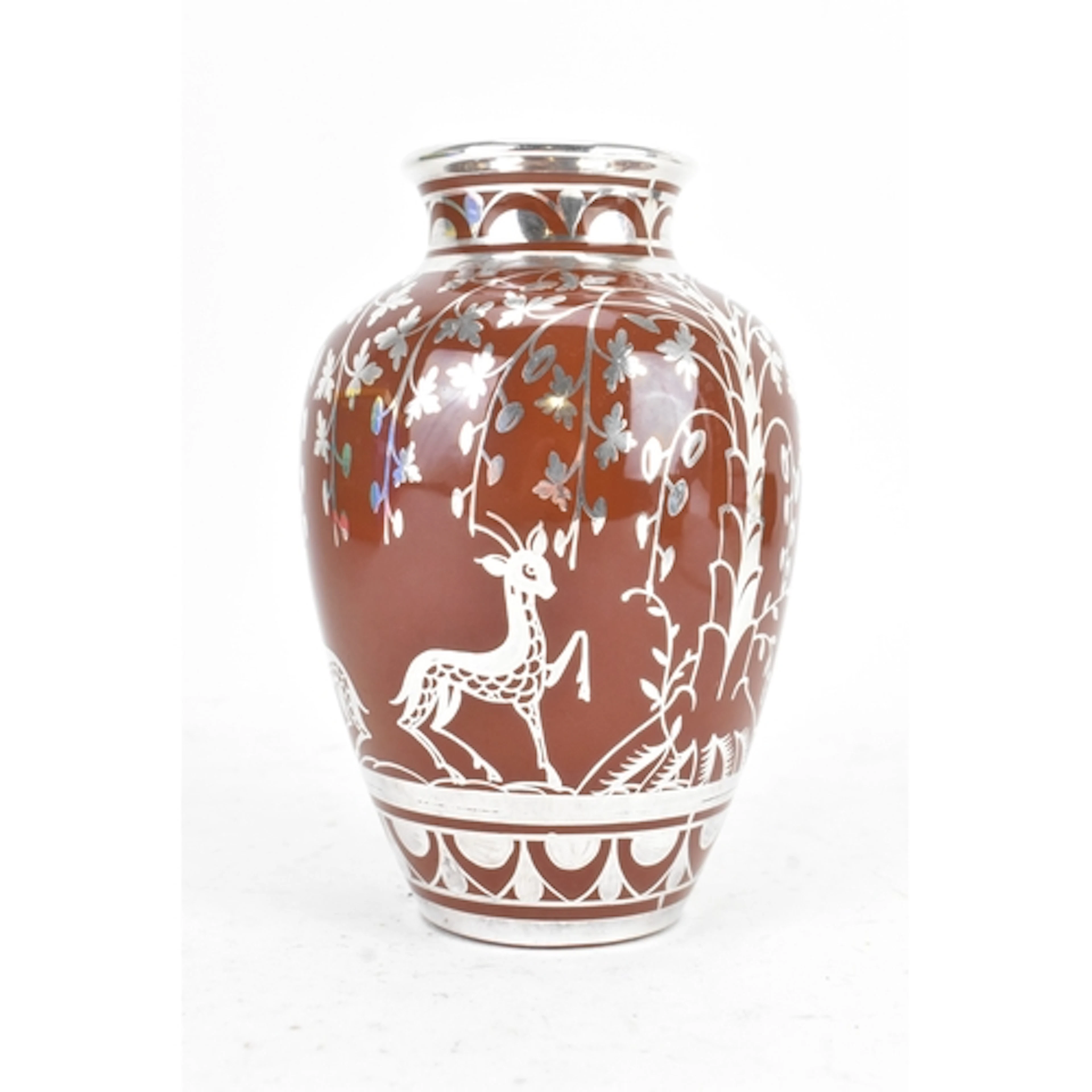 An Art Deco Richard Ginori vase, decorated with deer and flo...