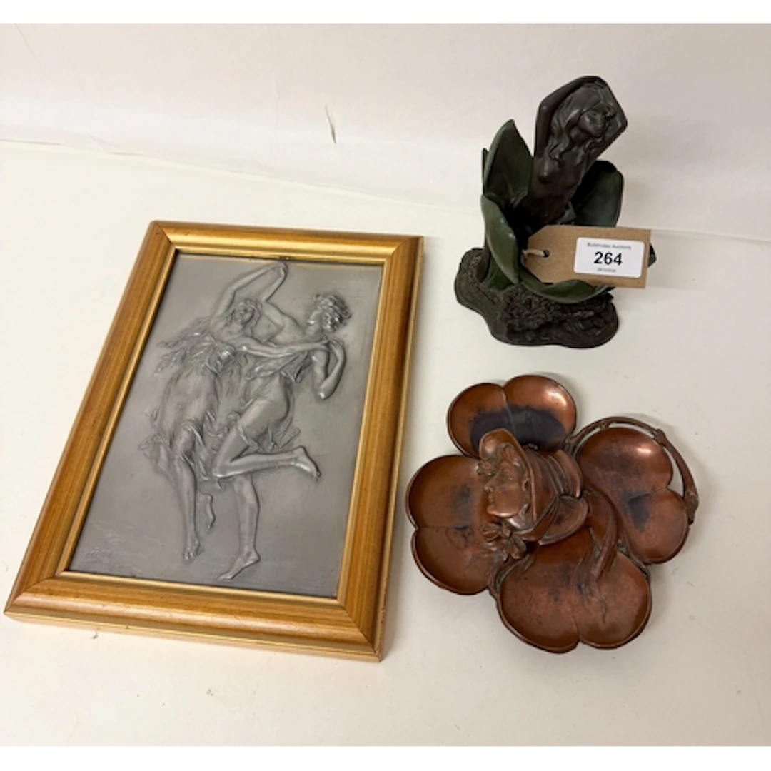 An Art Nouveau pewter plaque together with an Art Nouveau in...