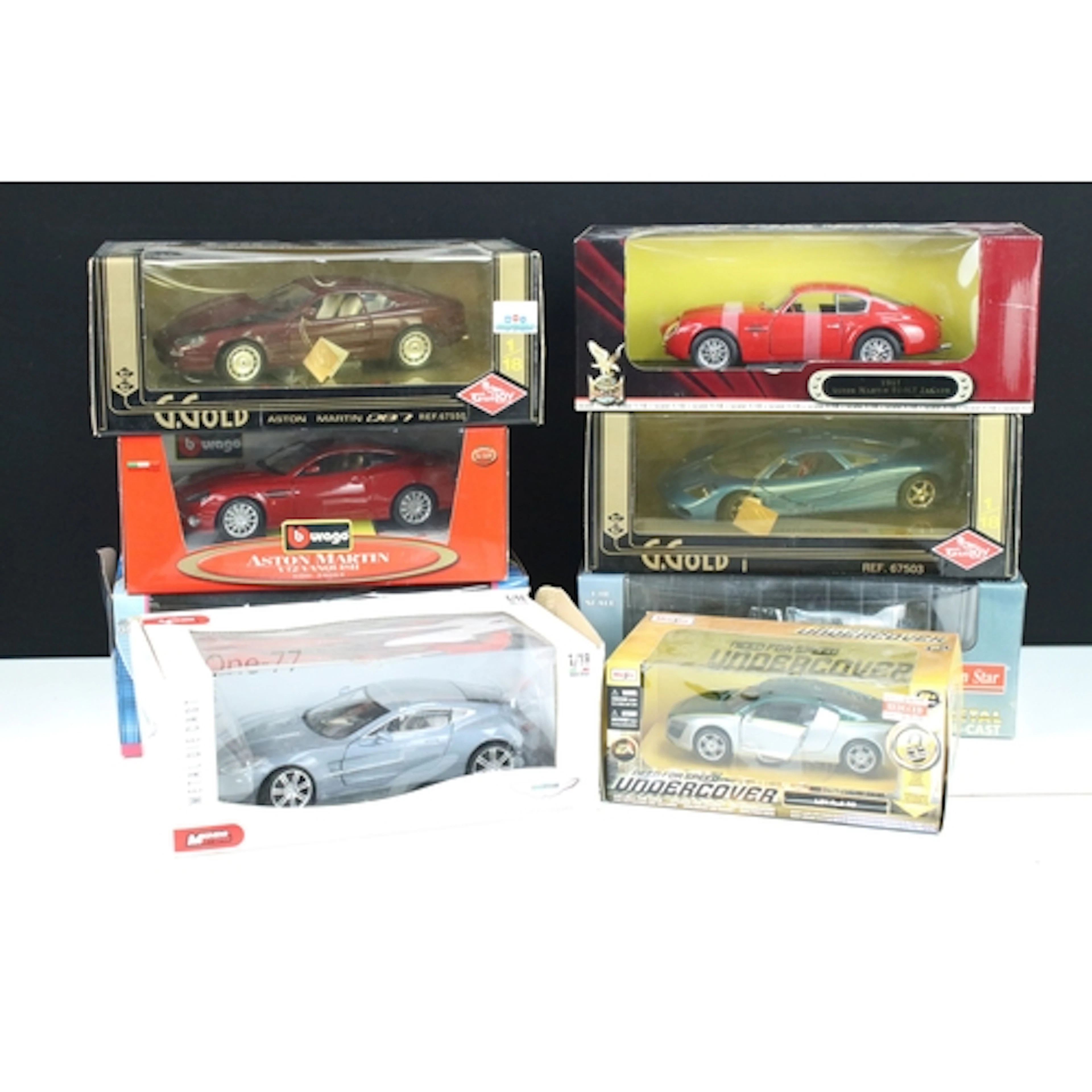 Eight boxed large scale diecast models to include 1/18 Sun S...