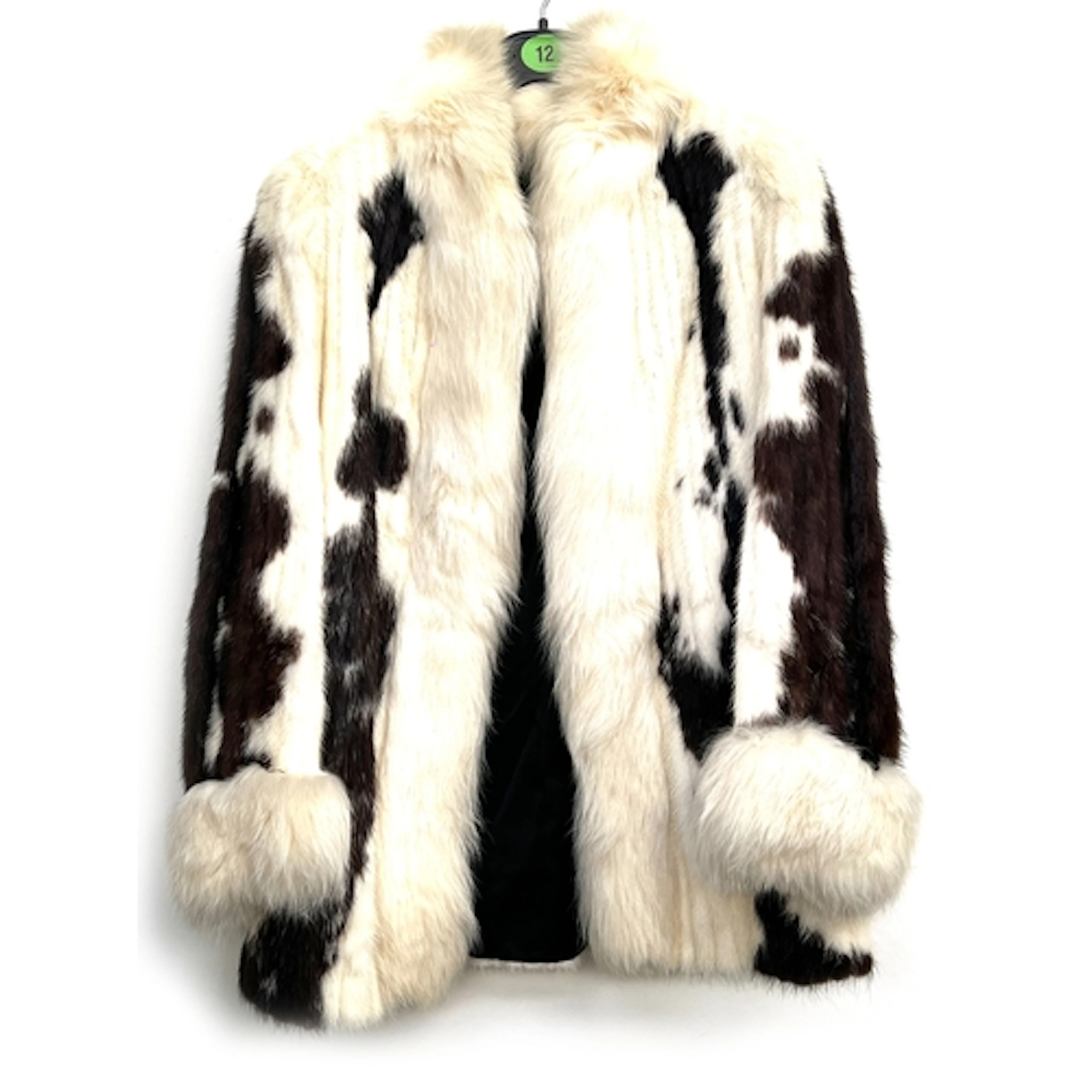 A vintage fur jacket in brown and white, approx. size 10
