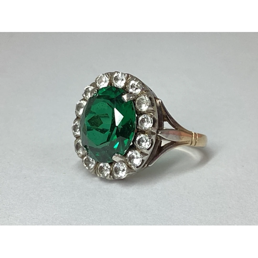 A Vintage Oval Shape Cocktail Ring, claw set throughout, bet...