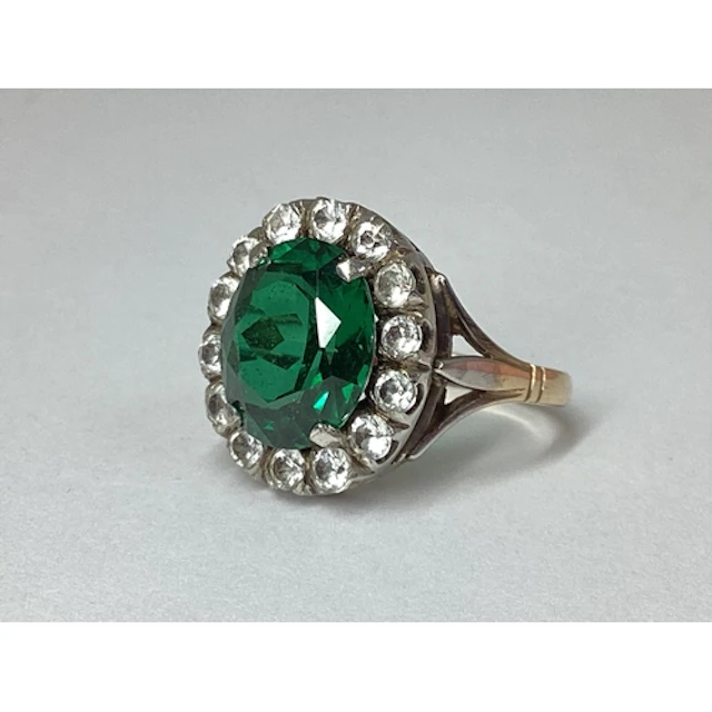 A Vintage Oval Shape Cocktail Ring, claw set throughout, bet...