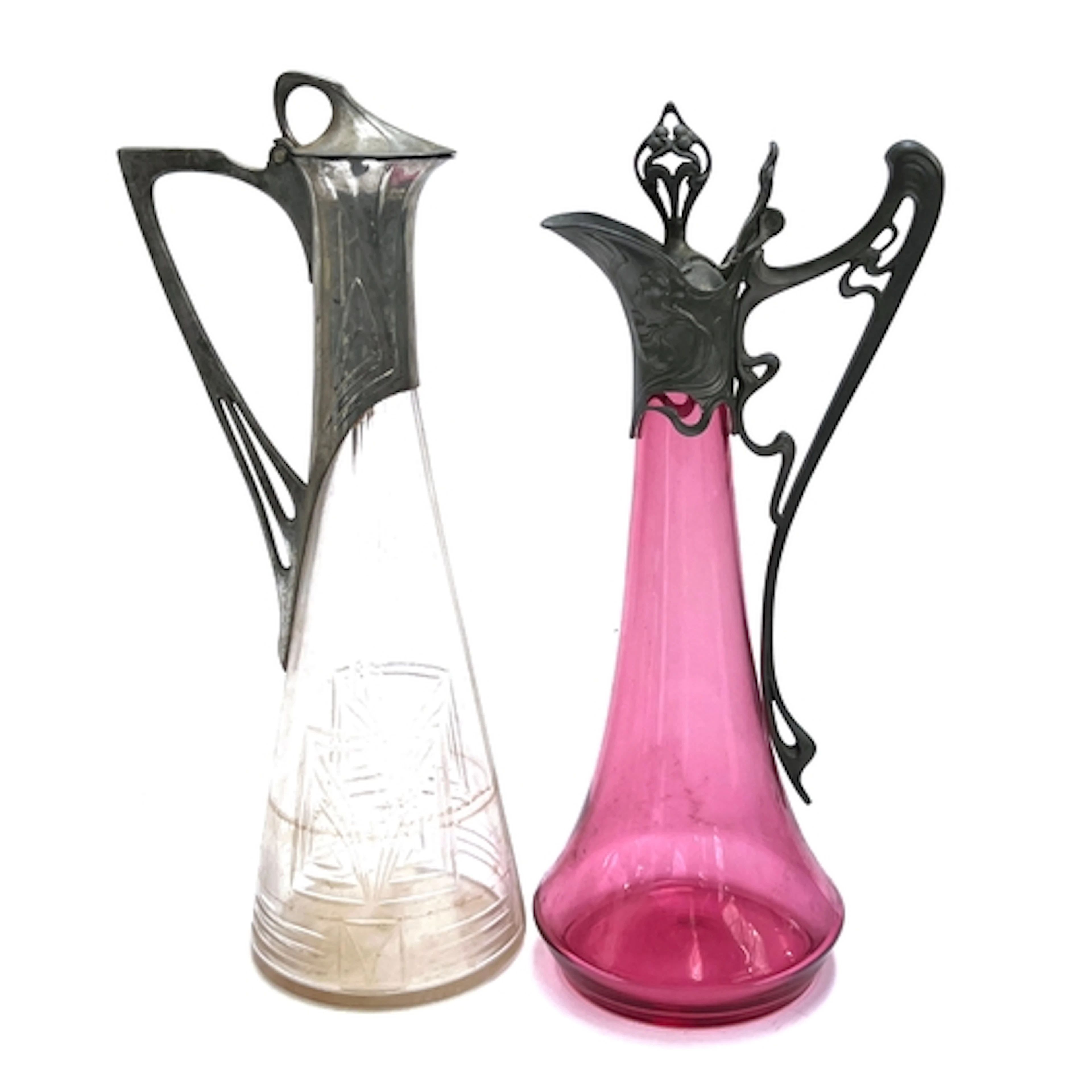 A cut glass and pewter mounted Art Nouveau pitcher, 42cmH; t...