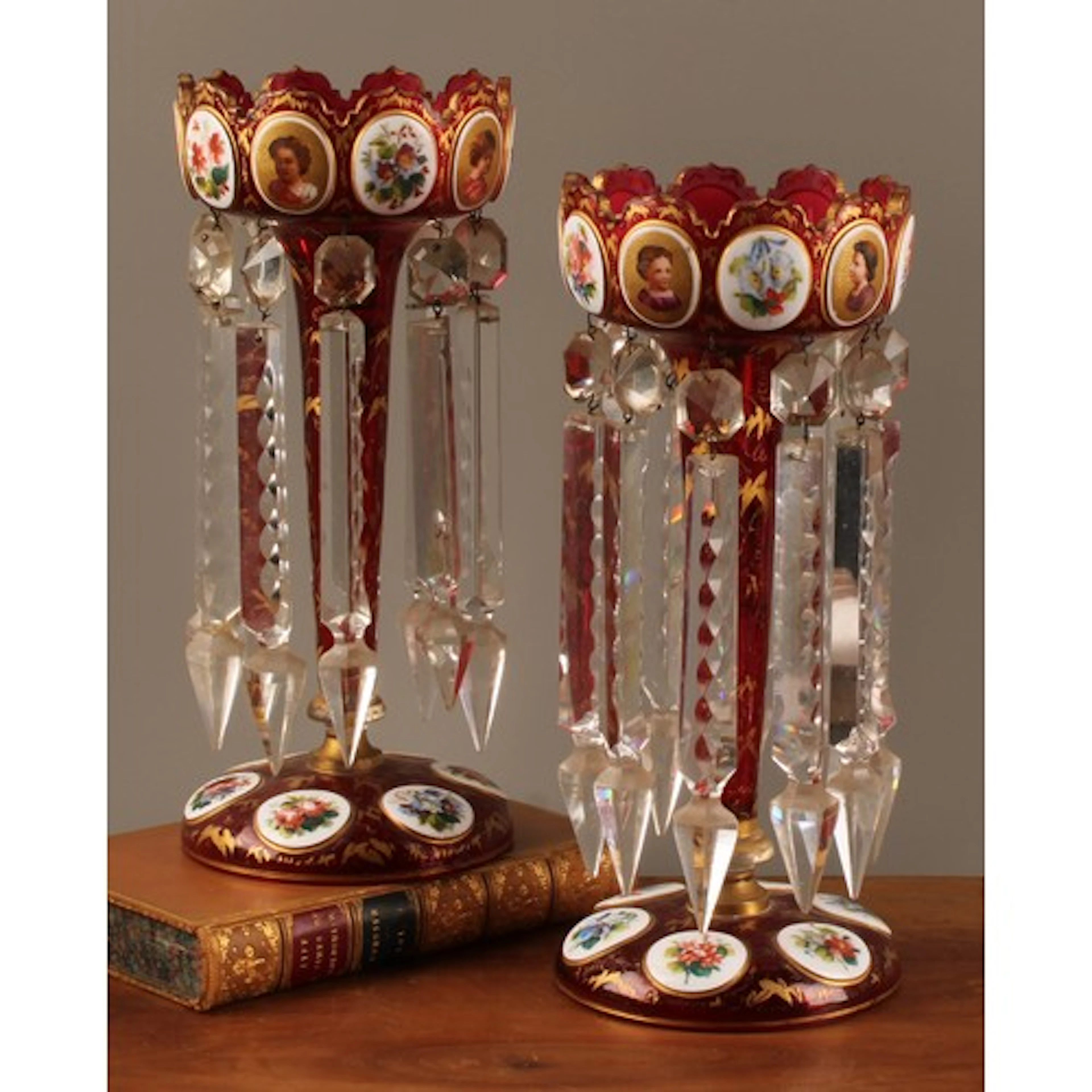 A pair of 19th century Bohemian ruby glass table lustres, th...