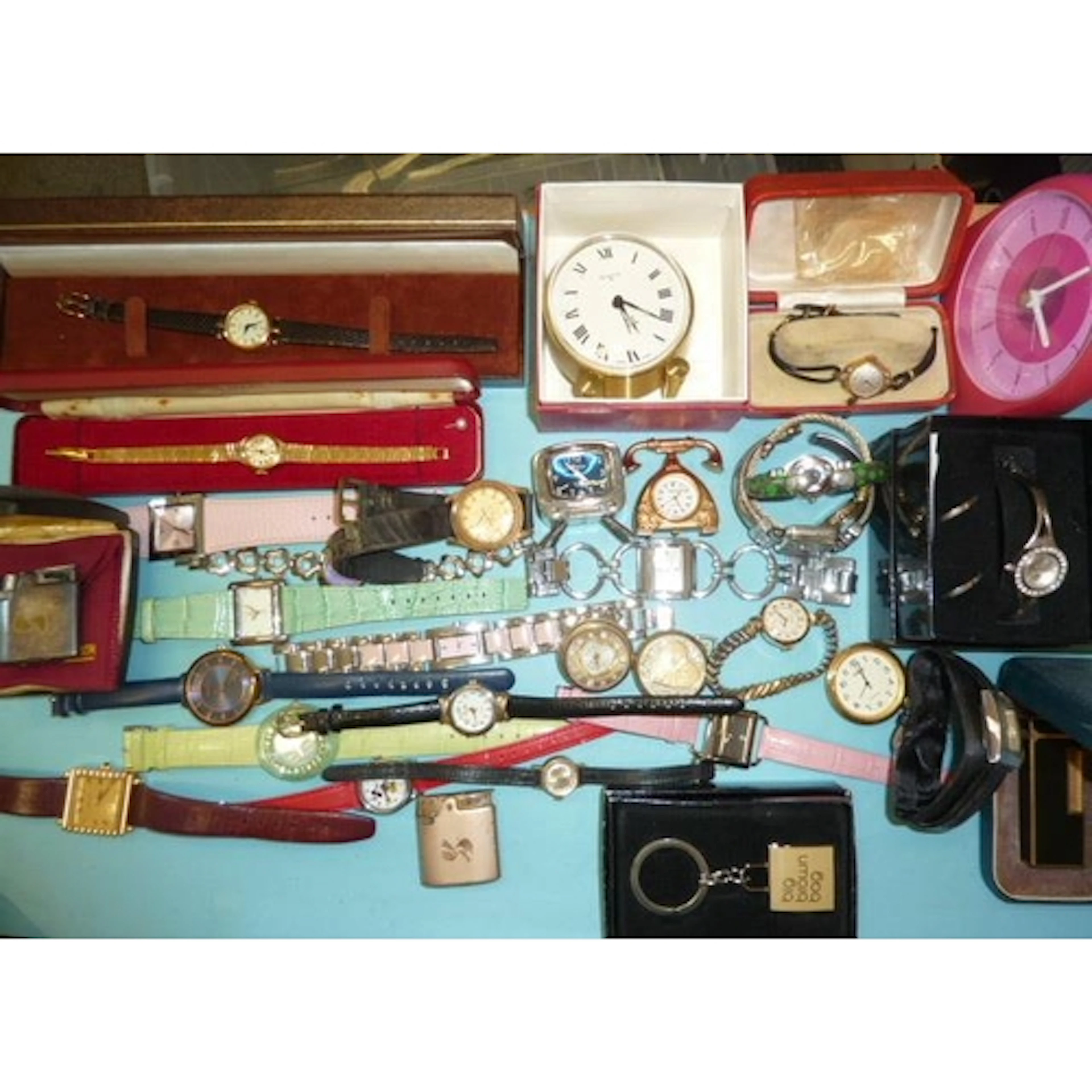 A Dunhill lighter (boxed), two Ronson lighters and a quantit...
