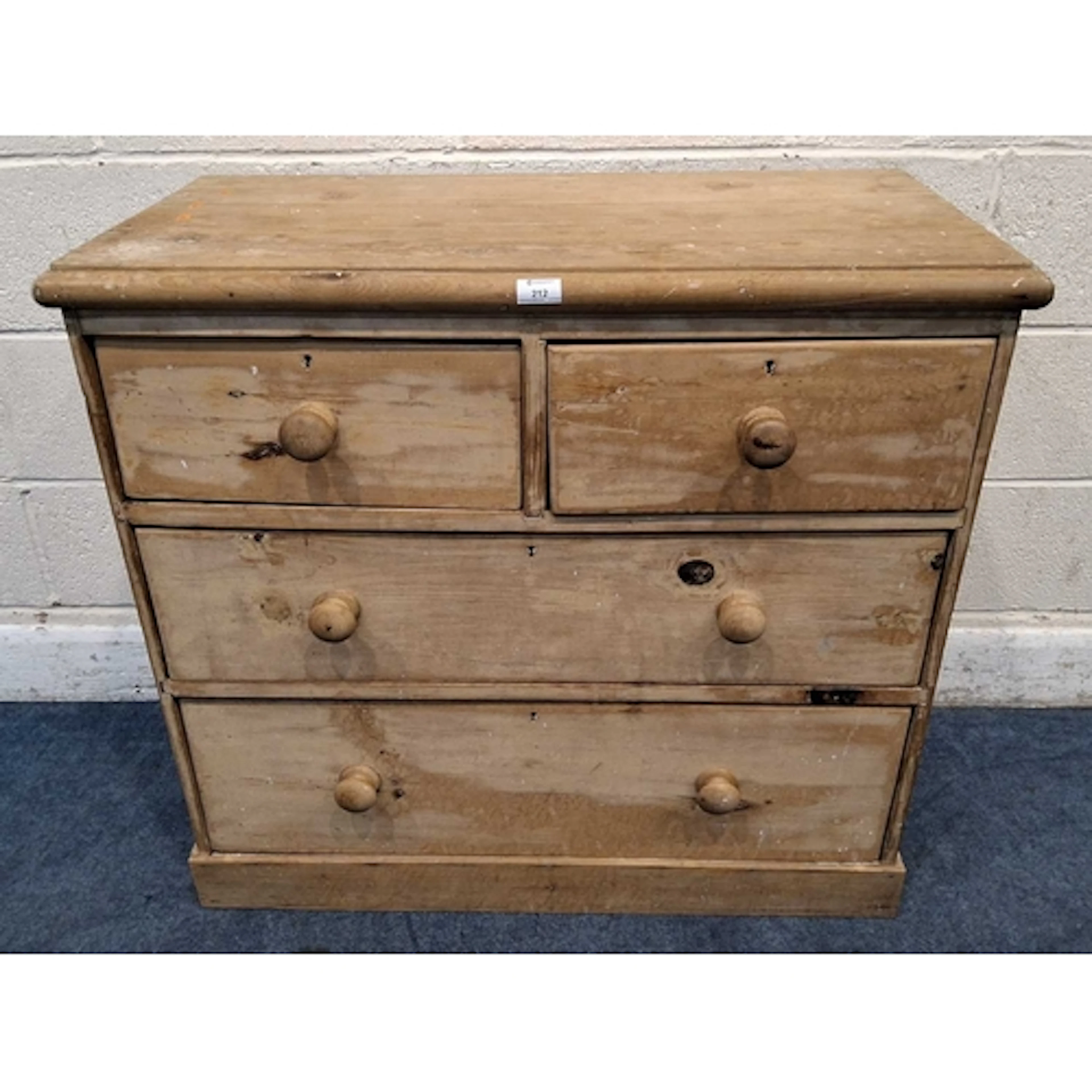 A 19TH CENTURY PINE CHEST OF TWO SHORT OVER TWO LONG DRAWERS...