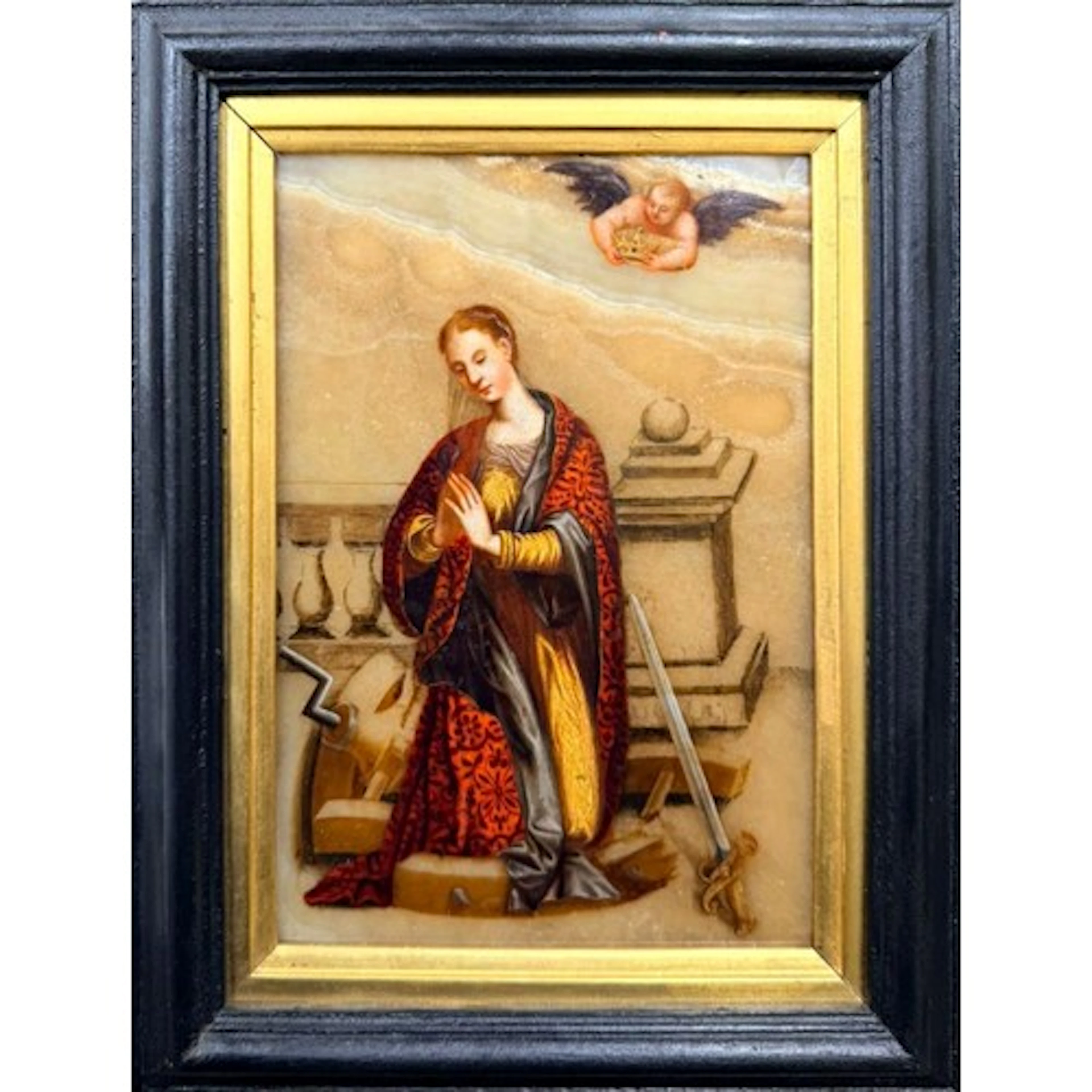 An Italian alabaster painting depicting Saint Catherine of A...
