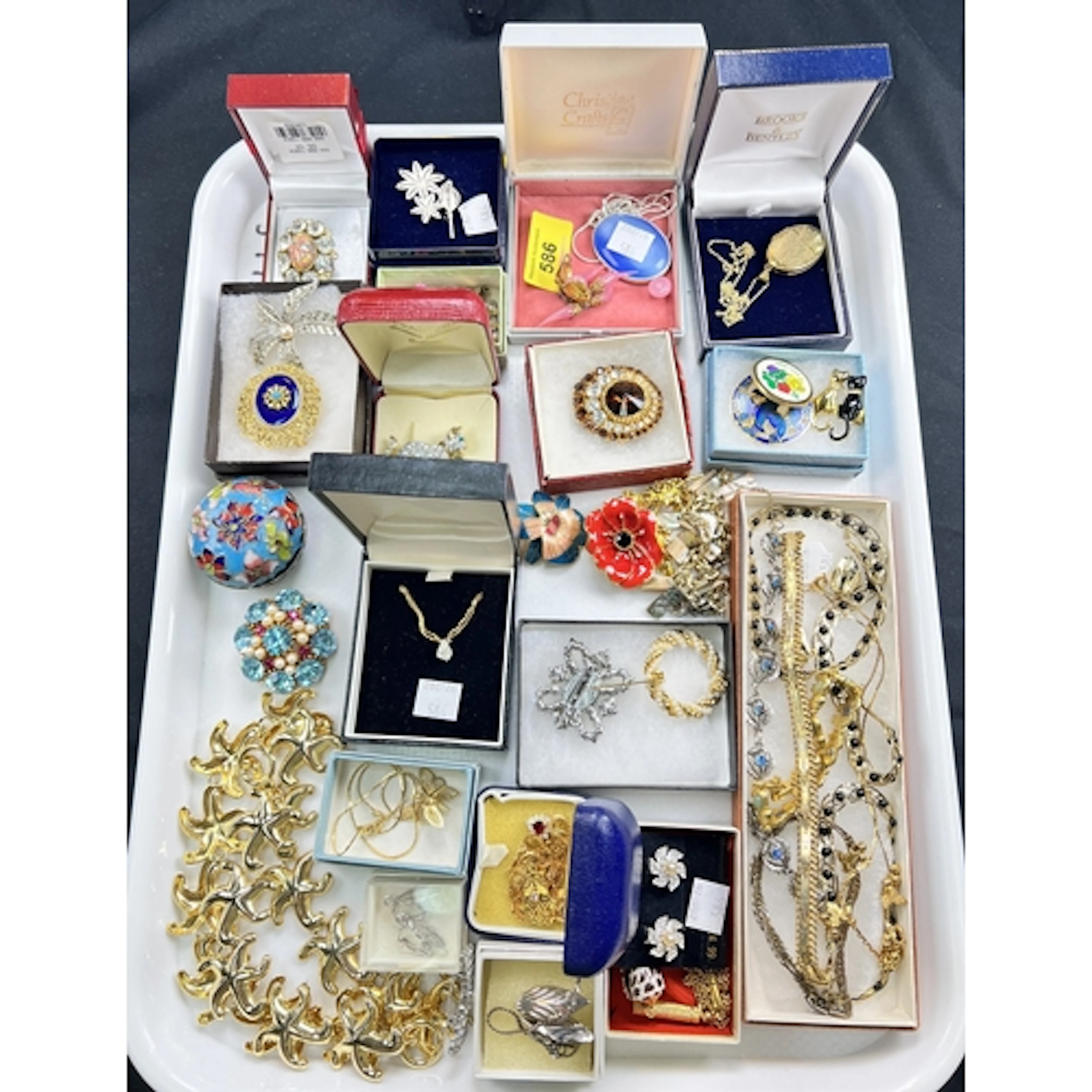 A selection of costume jewellery - mainly necklaces and broo...