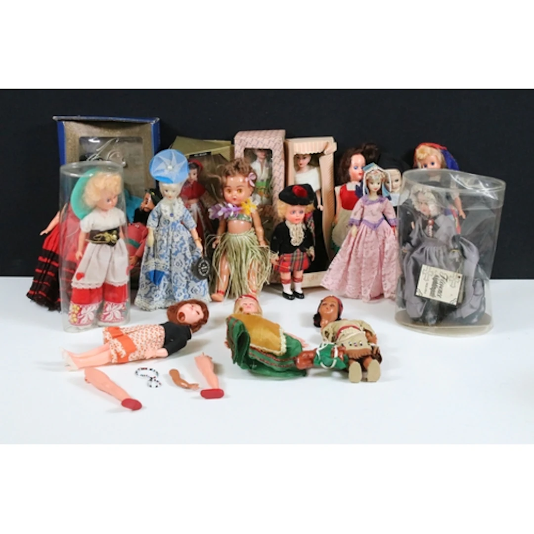 Collection of miniature plastic dolls including traditional ...