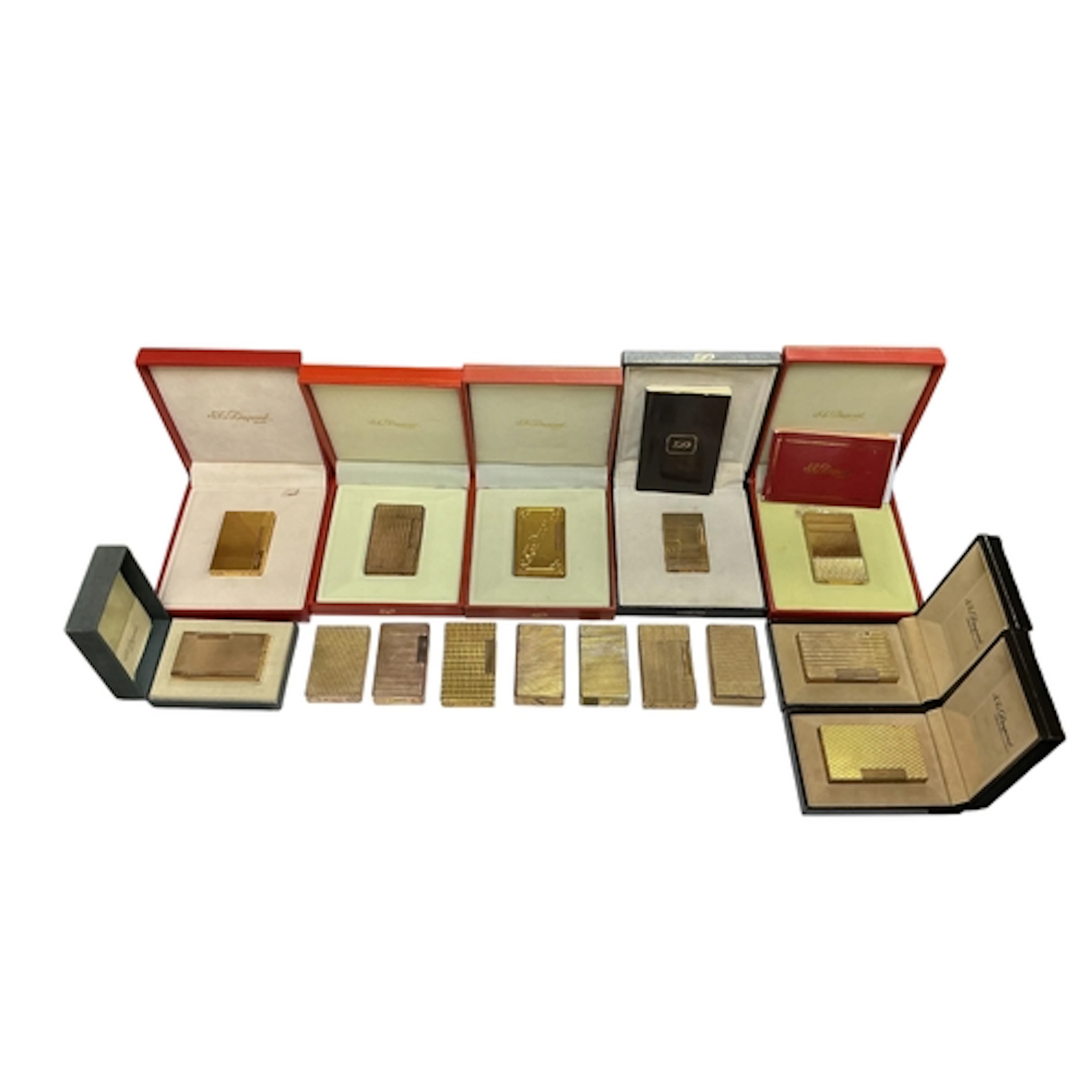 A collection of fifteen S.T. Dupont gold-plated lighters, so...
