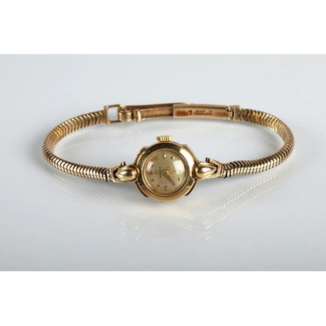Ladies Omega 9ct gold wrist watch on 9ct gold strap, gross w...