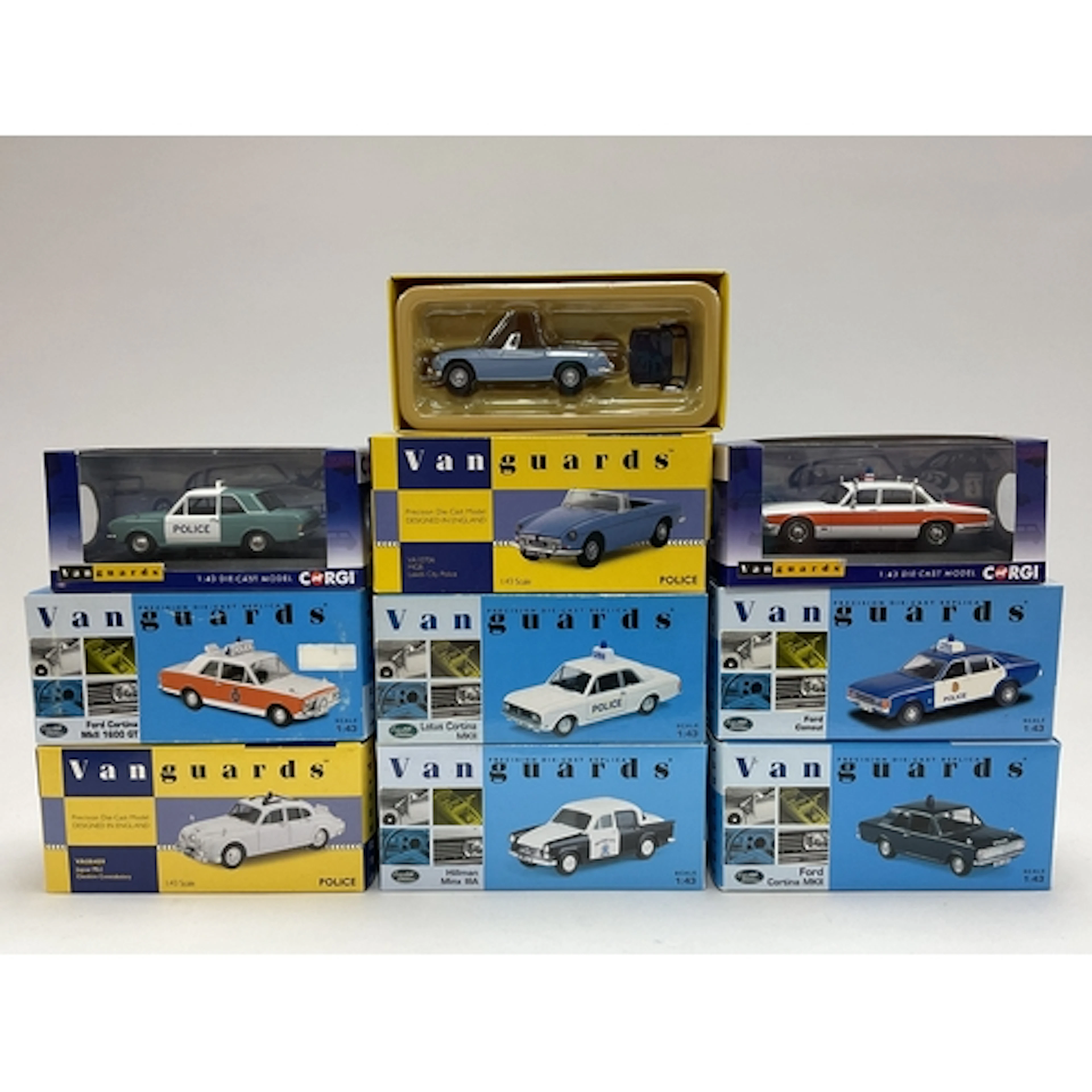 Nine Corgi, Lledo Vanguards 1:43rd scale diecast model polic...