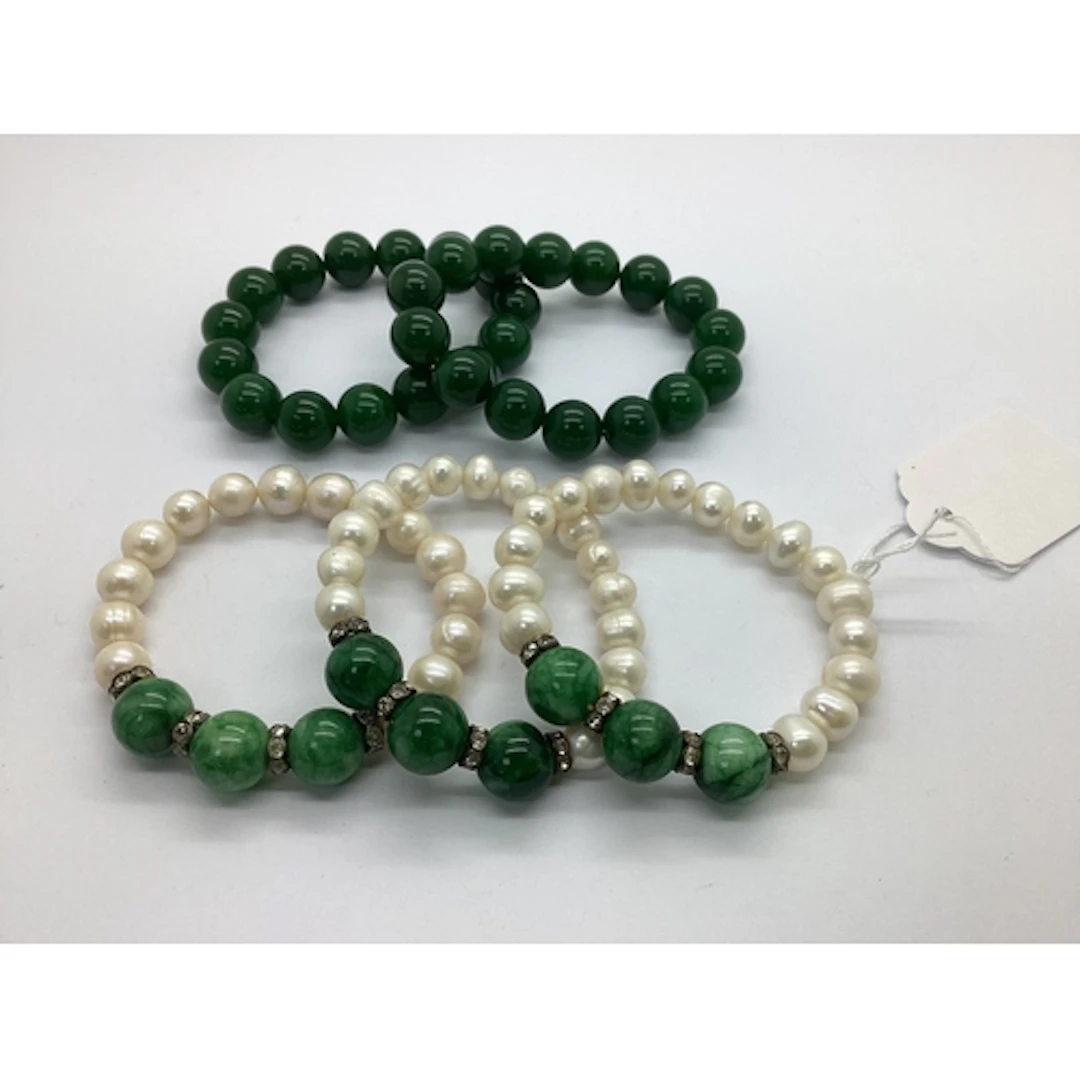 Three Pearl Bead Bracelets, with green polished hardstone be...