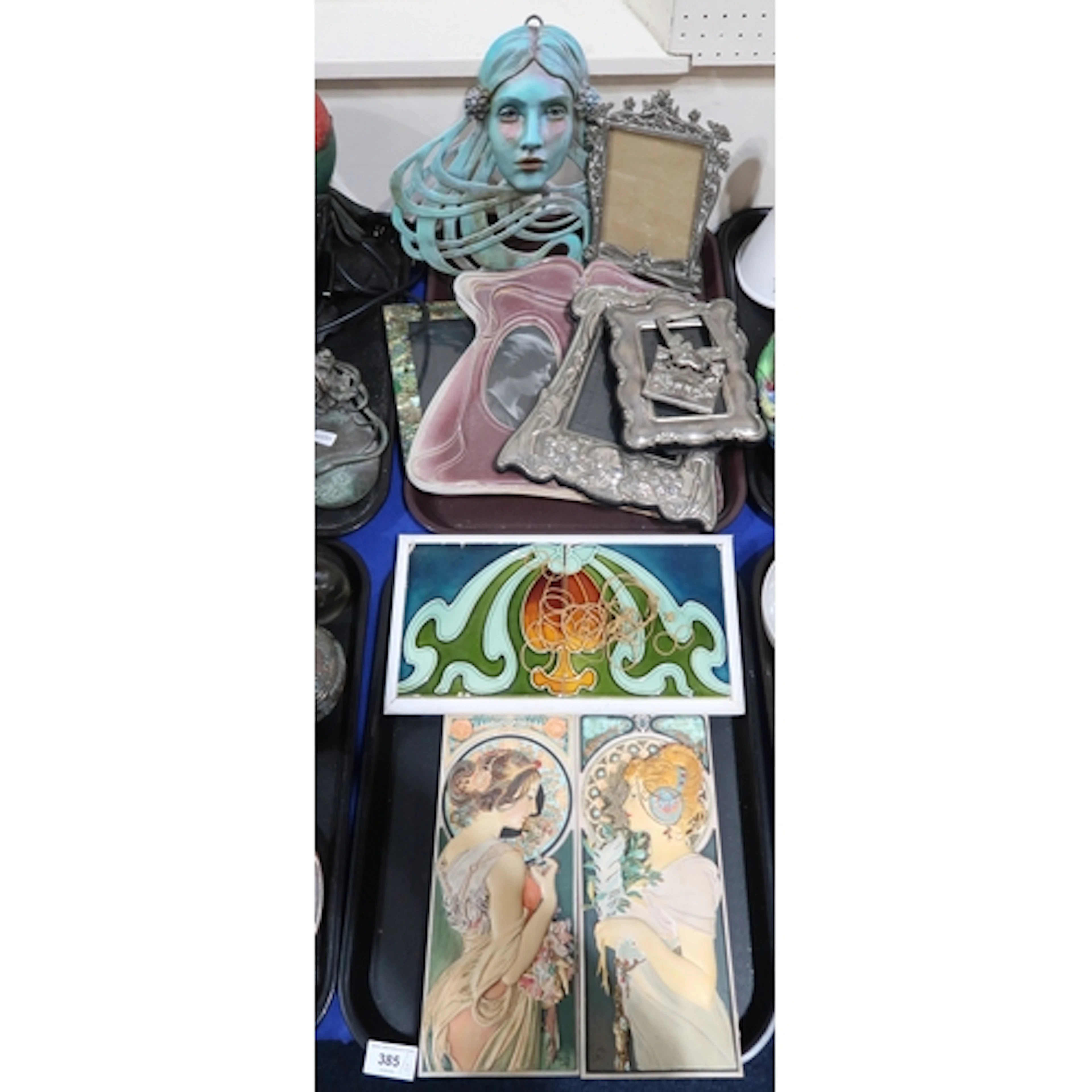 Art Nouveau style silver plated frames, a ceramic frame, a t...