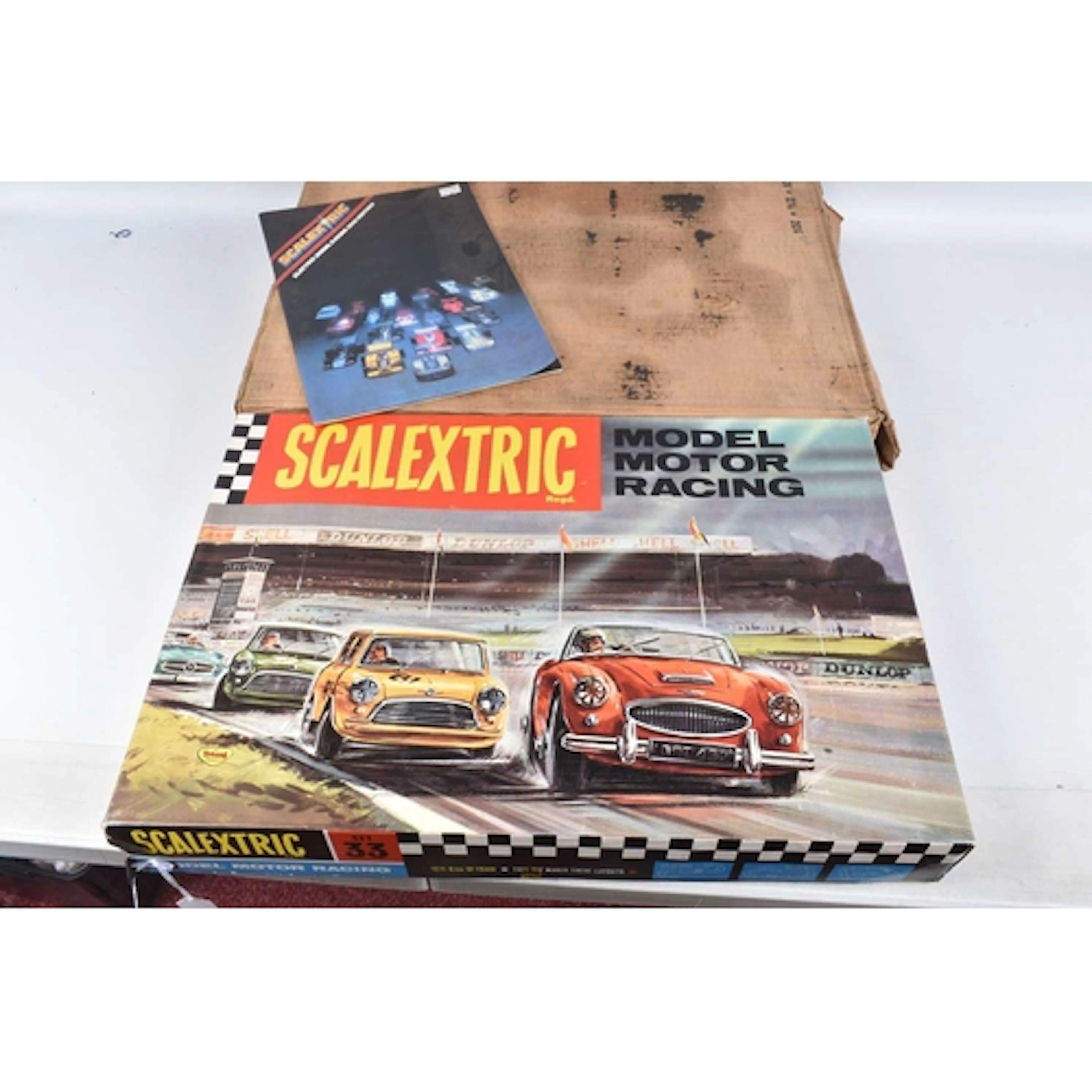 A BOXED SCALEXTRIC MOTOR RACING SET No.33, the set appears l...