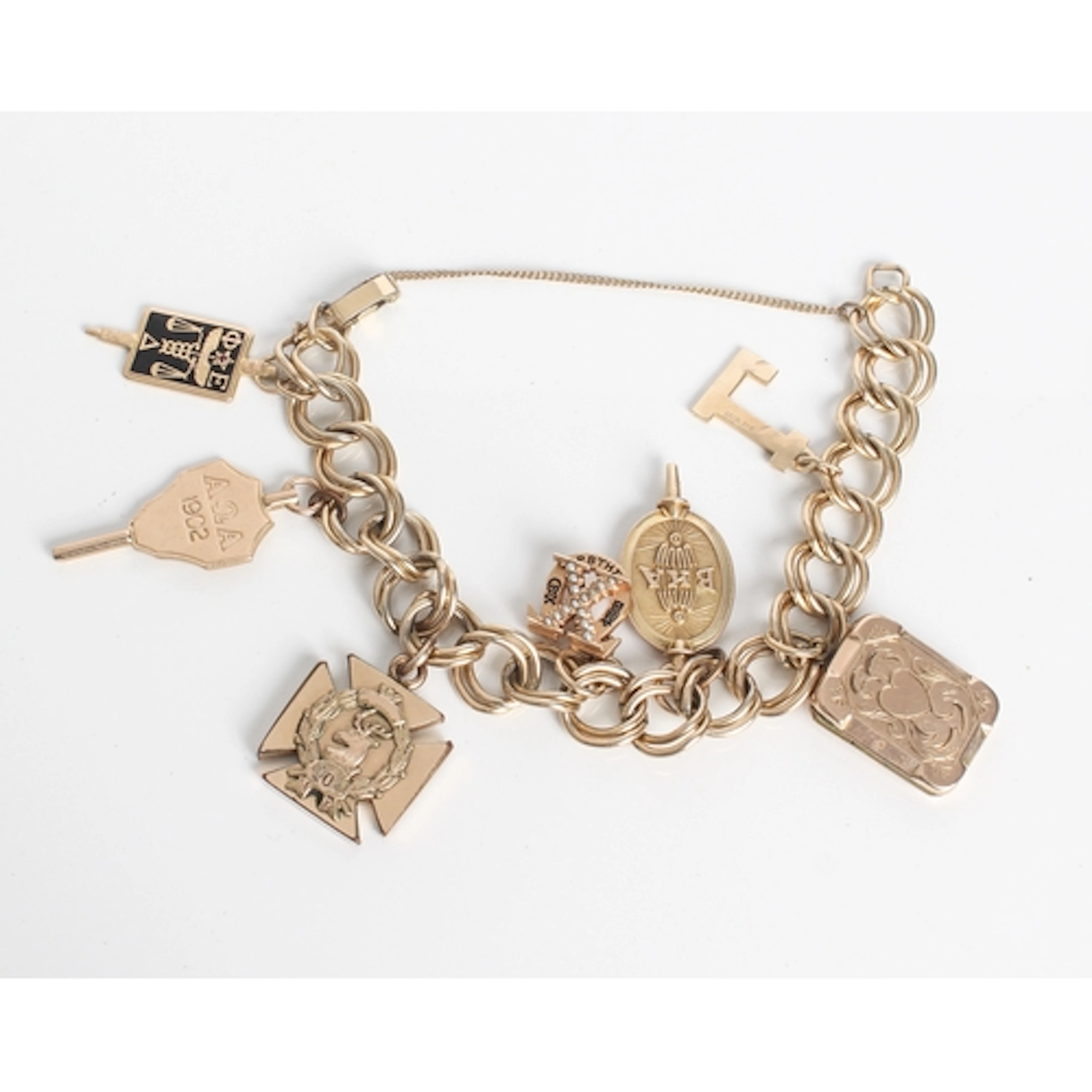 A 1930s-40s rolled gold charm bracelet with masonic charms -...
