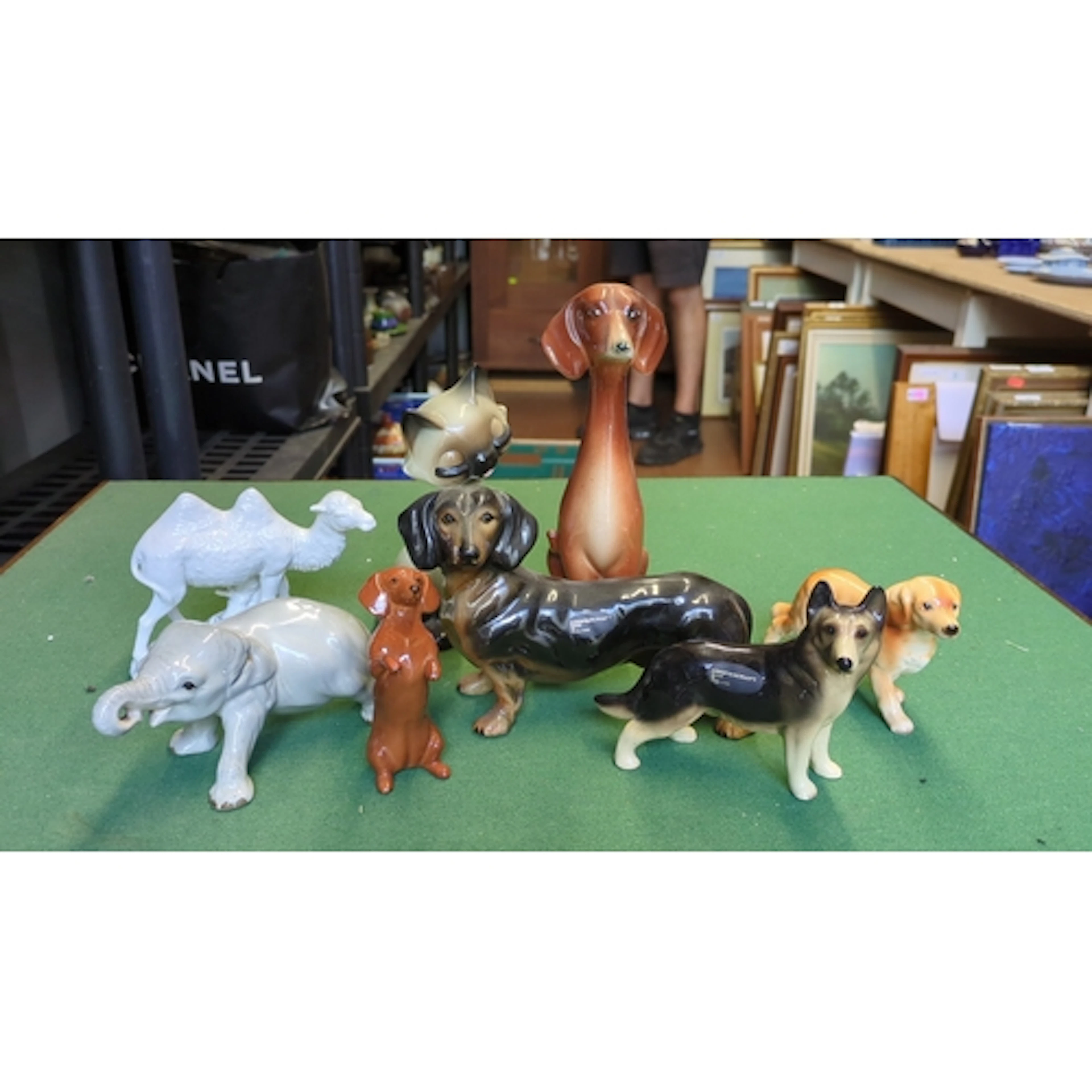 A group of glazed ceramic animal models, including Coopercra...