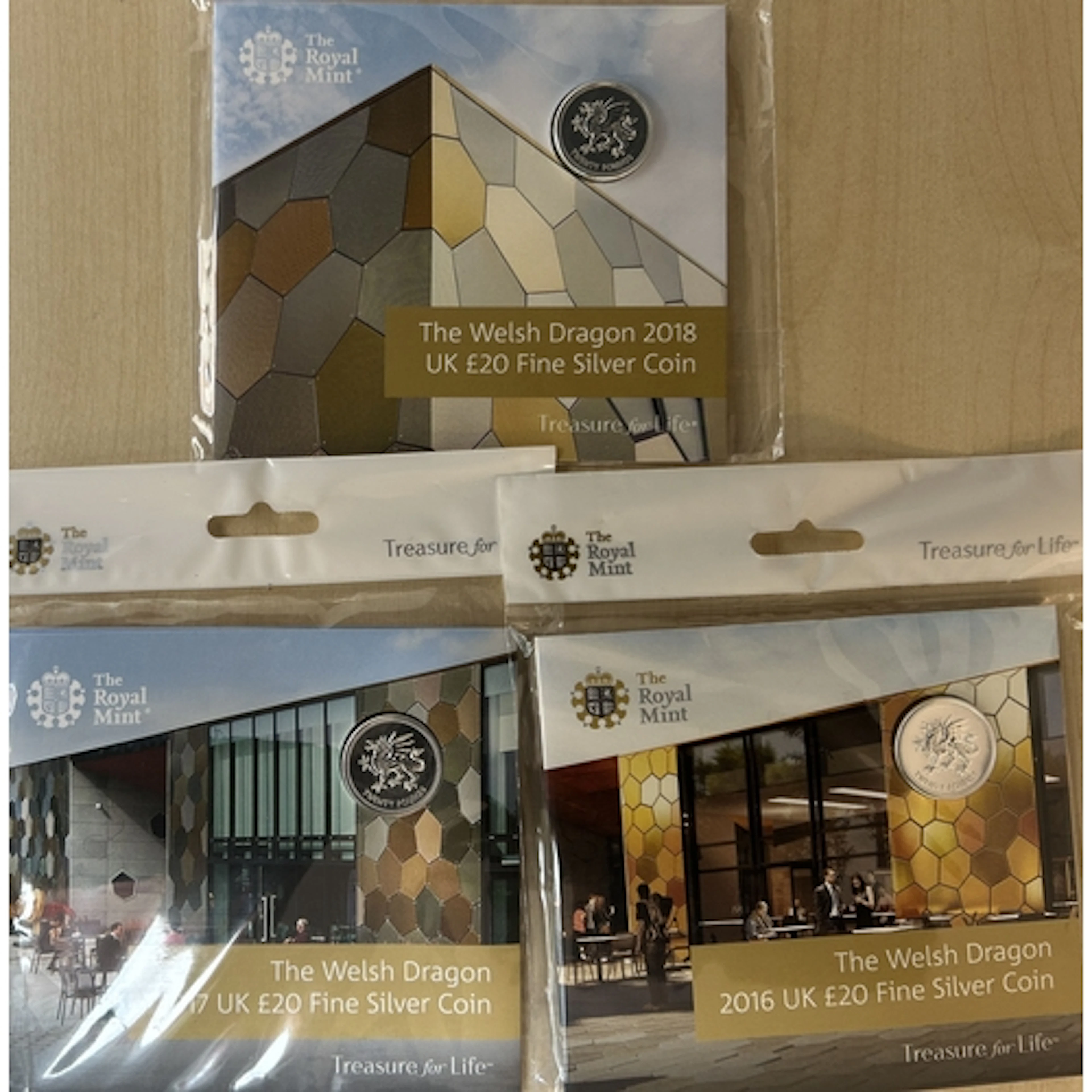 A group of three UK Queen Elizabeth II Royal Mint brilliant ...