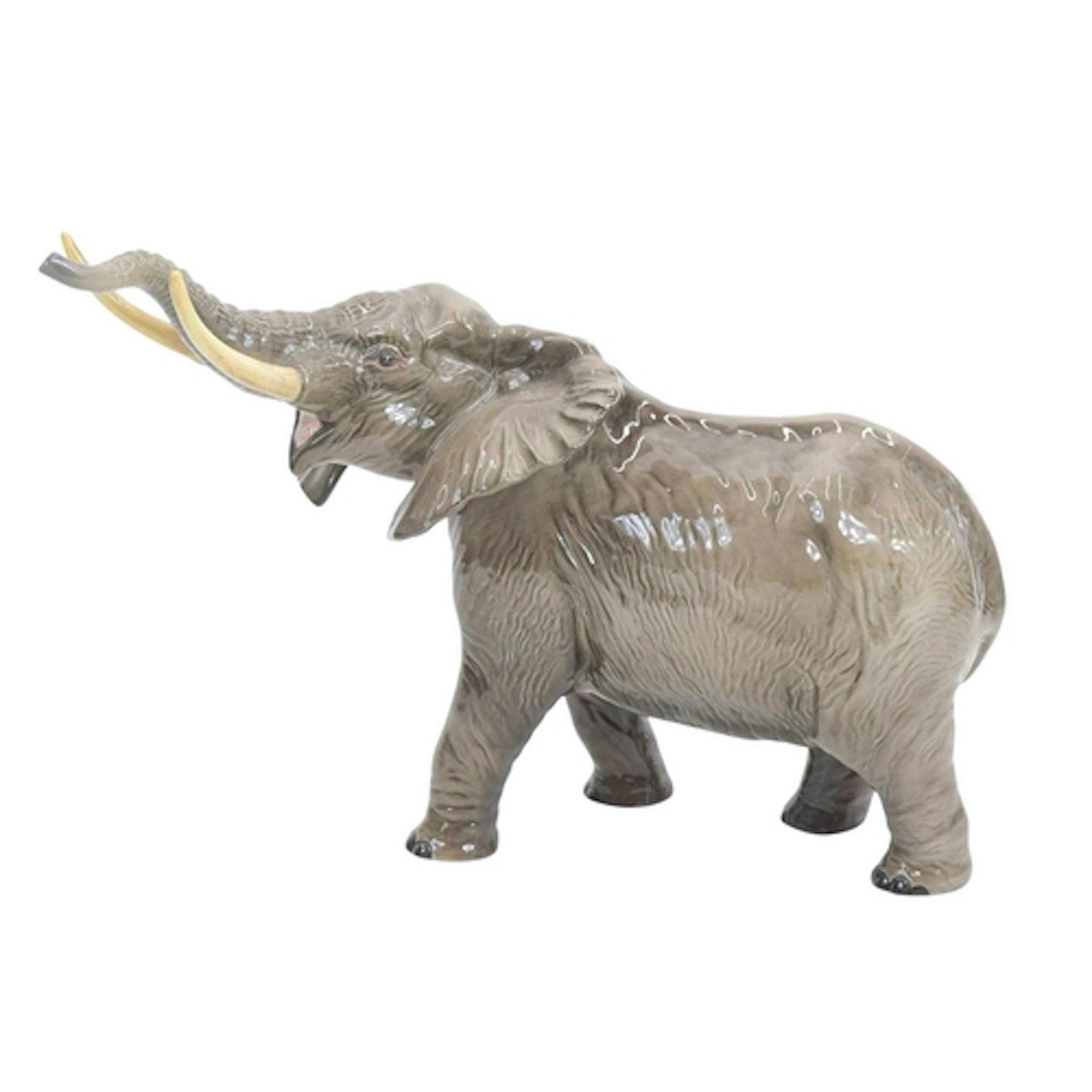 A Beswick large gloss figure of an elephant. With an extende...