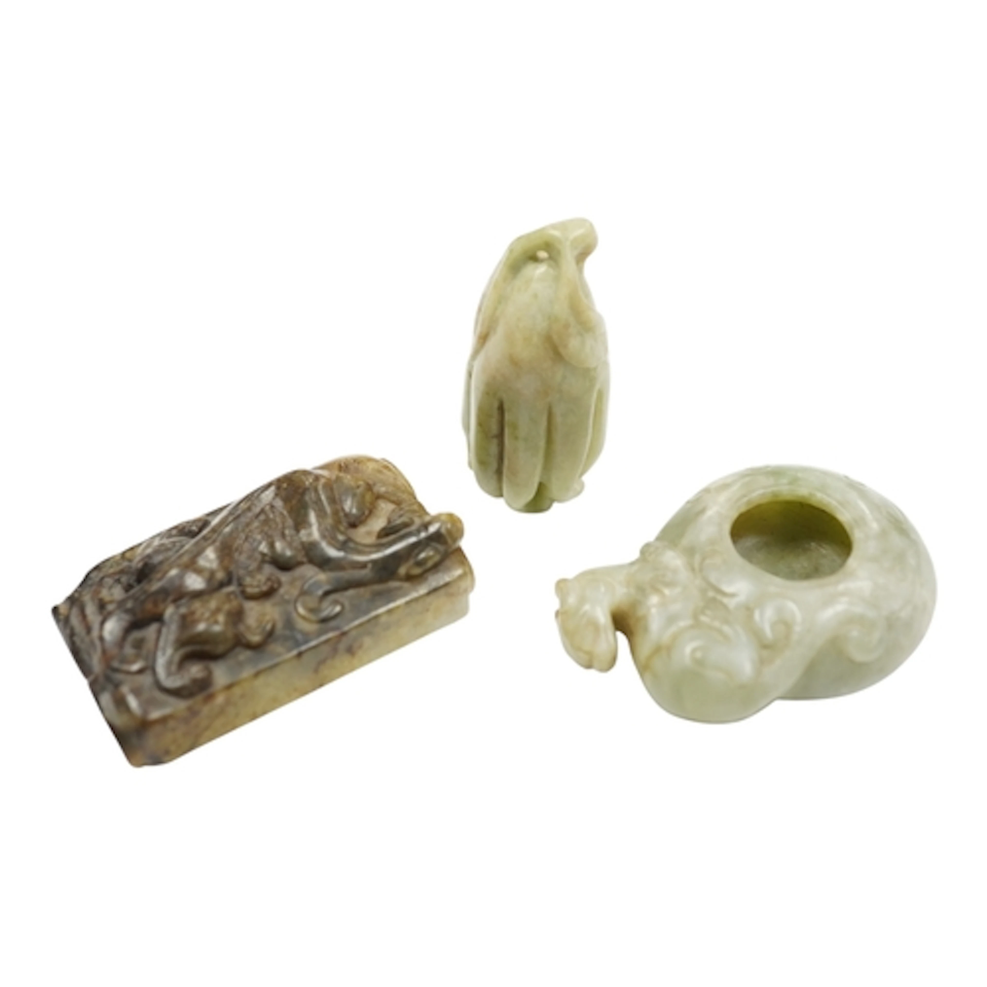 Three Chinese archaistic jade carvings to include a miniatur...
