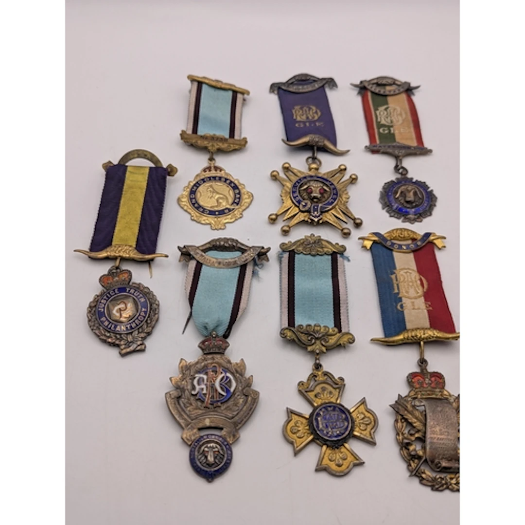 Seven silver and silver gilt Buffalo medals all having ename...
