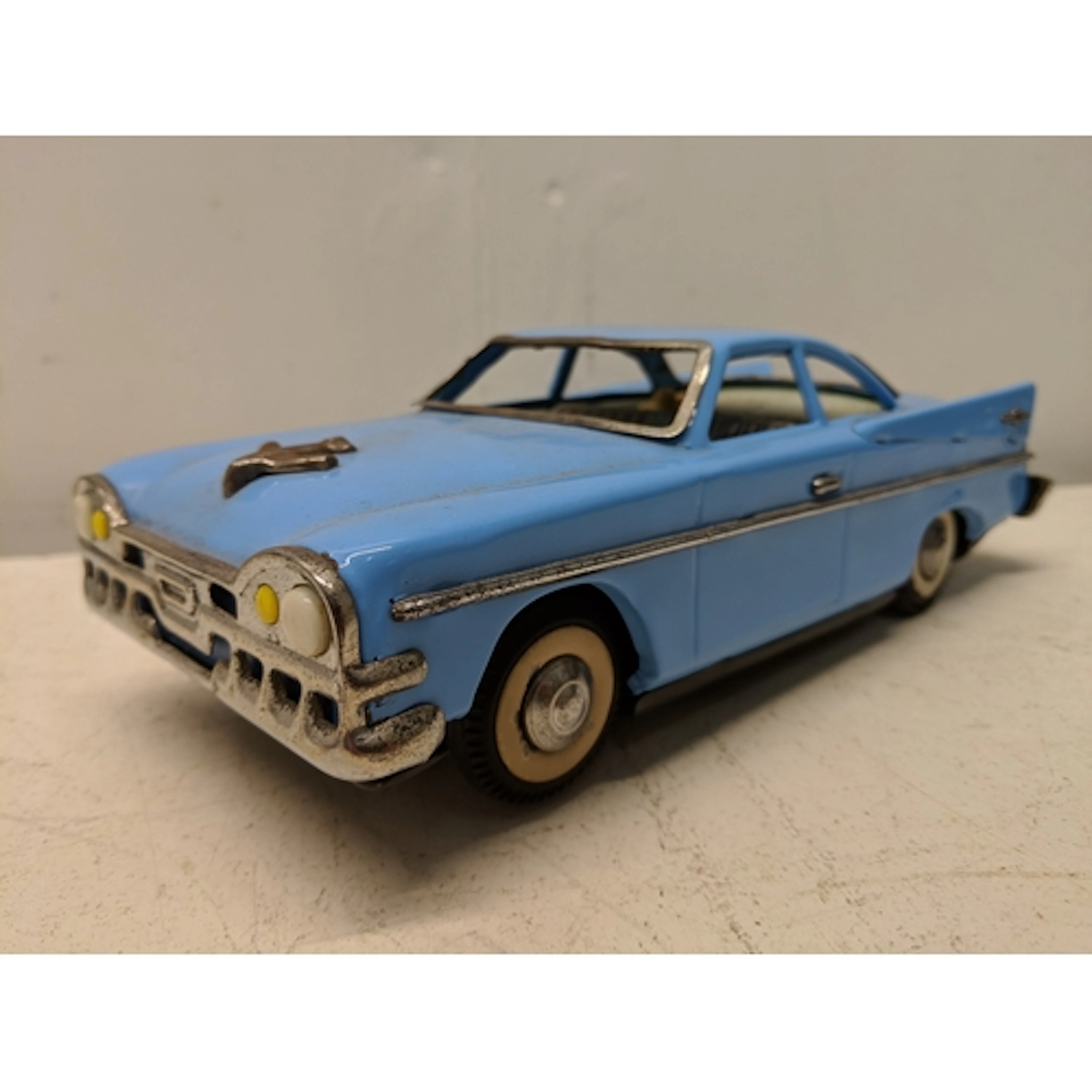 A tinplate Chinese blue battery operated streamline electric...