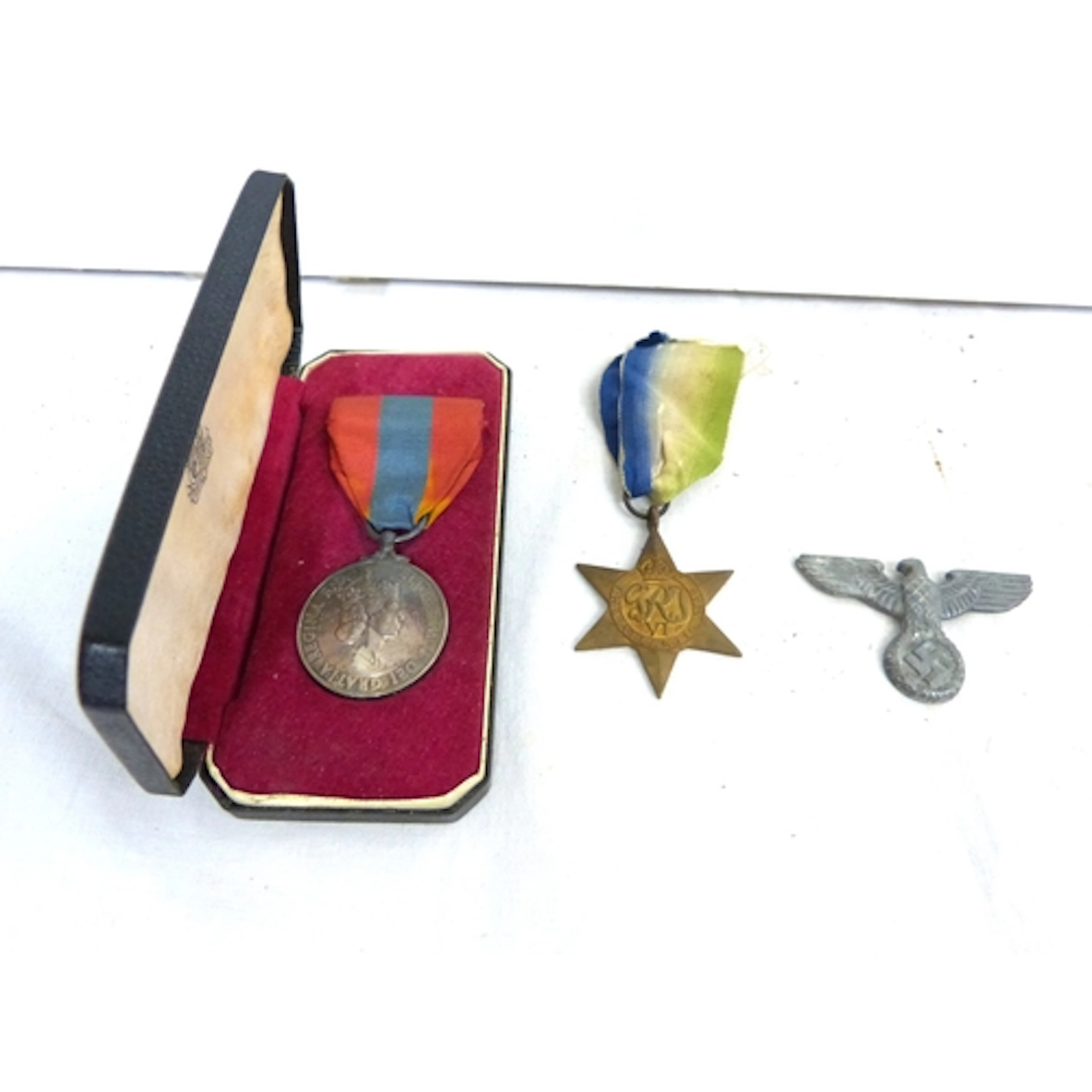 Imperial service medal, German badge etc.