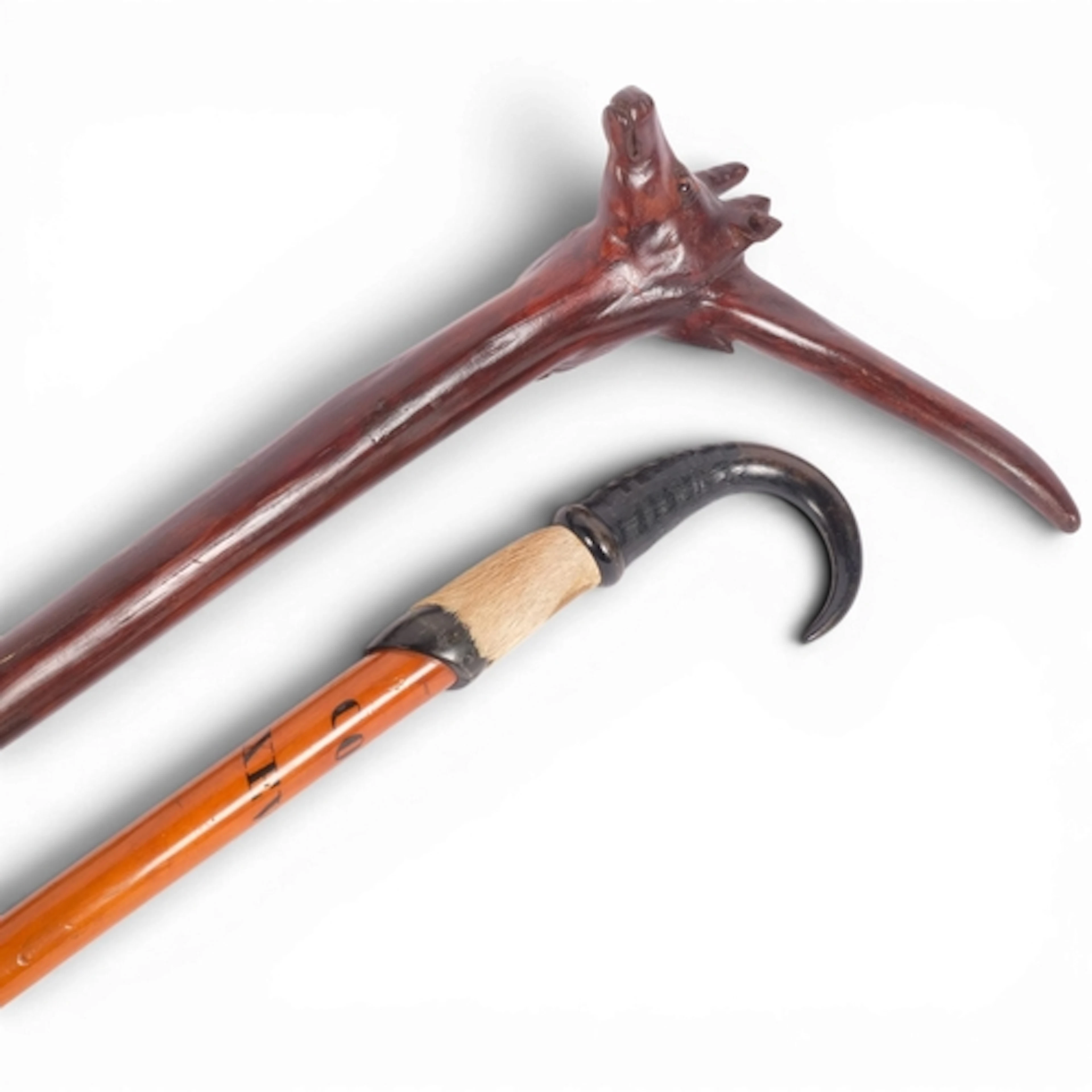 A Folk Art one-piece walking cane, the root system re-carved...