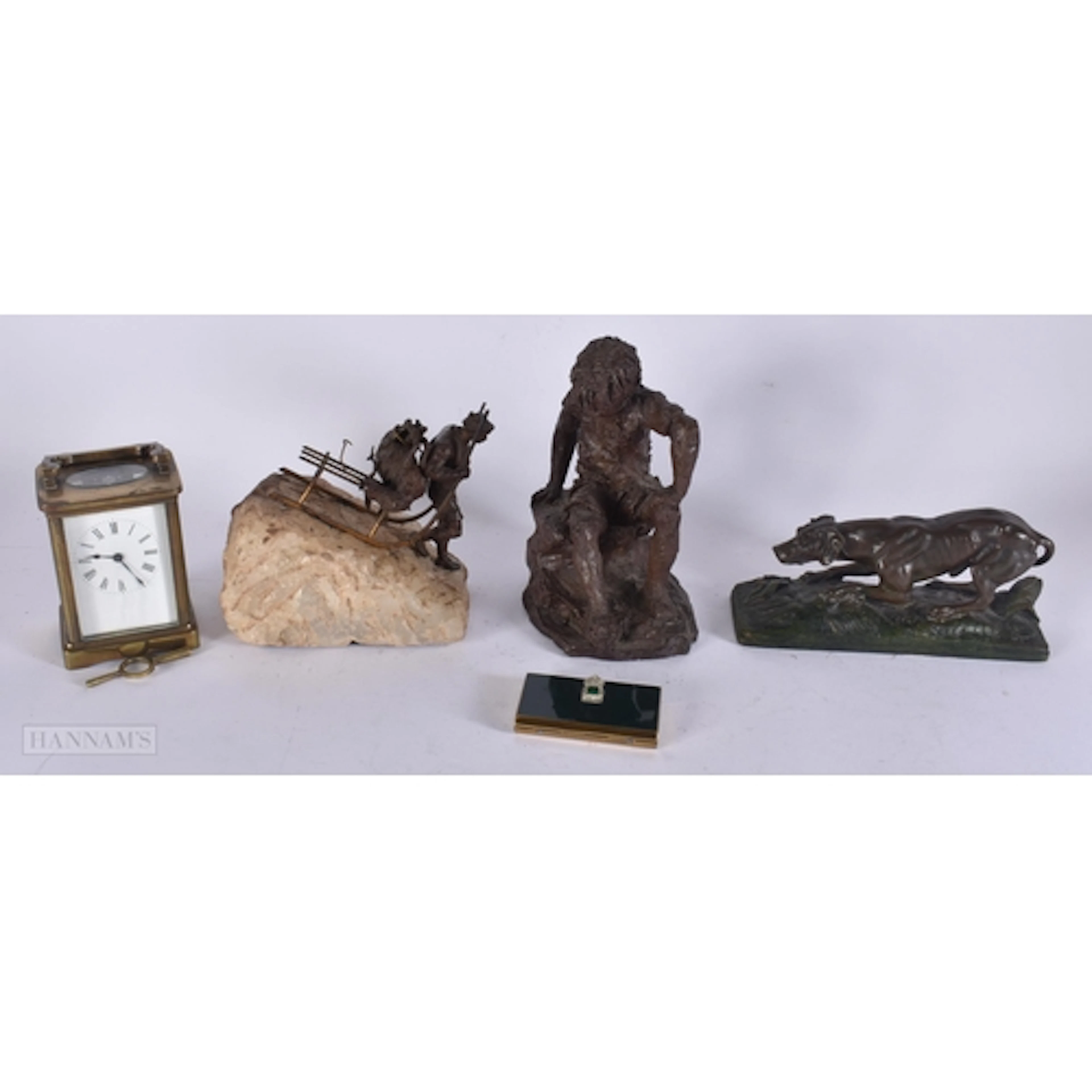 A FRENCH BRASS CARRIAGE CLOCK together with an unusual bronz...