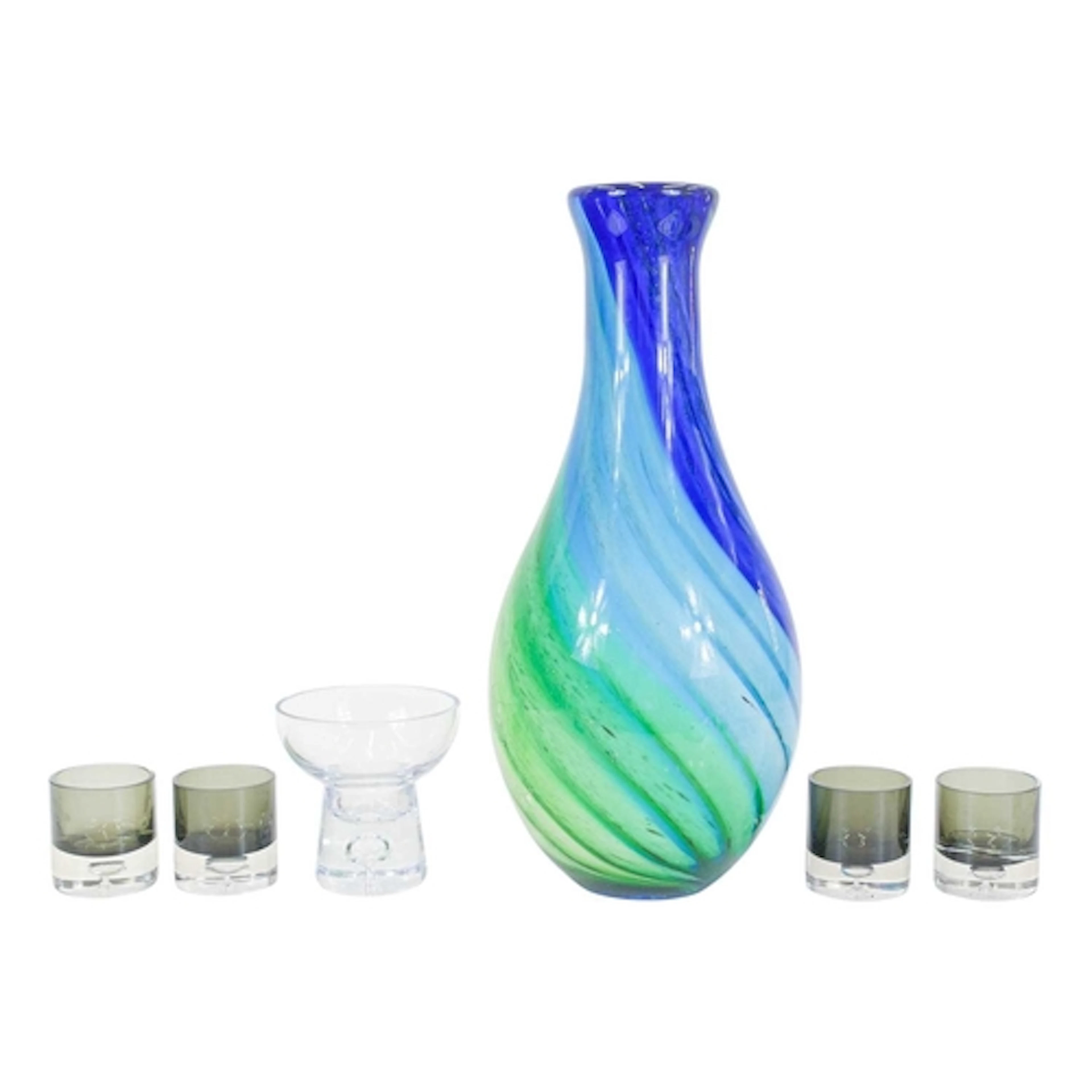 Mid century glassware. Four grey shot glasses or tealight ho...