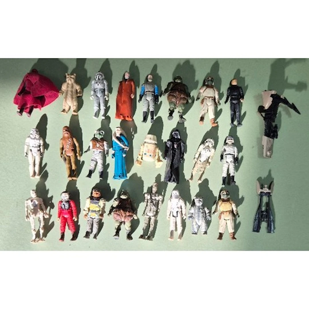 A group of 24 assorted original Star Wars figures & a speede...