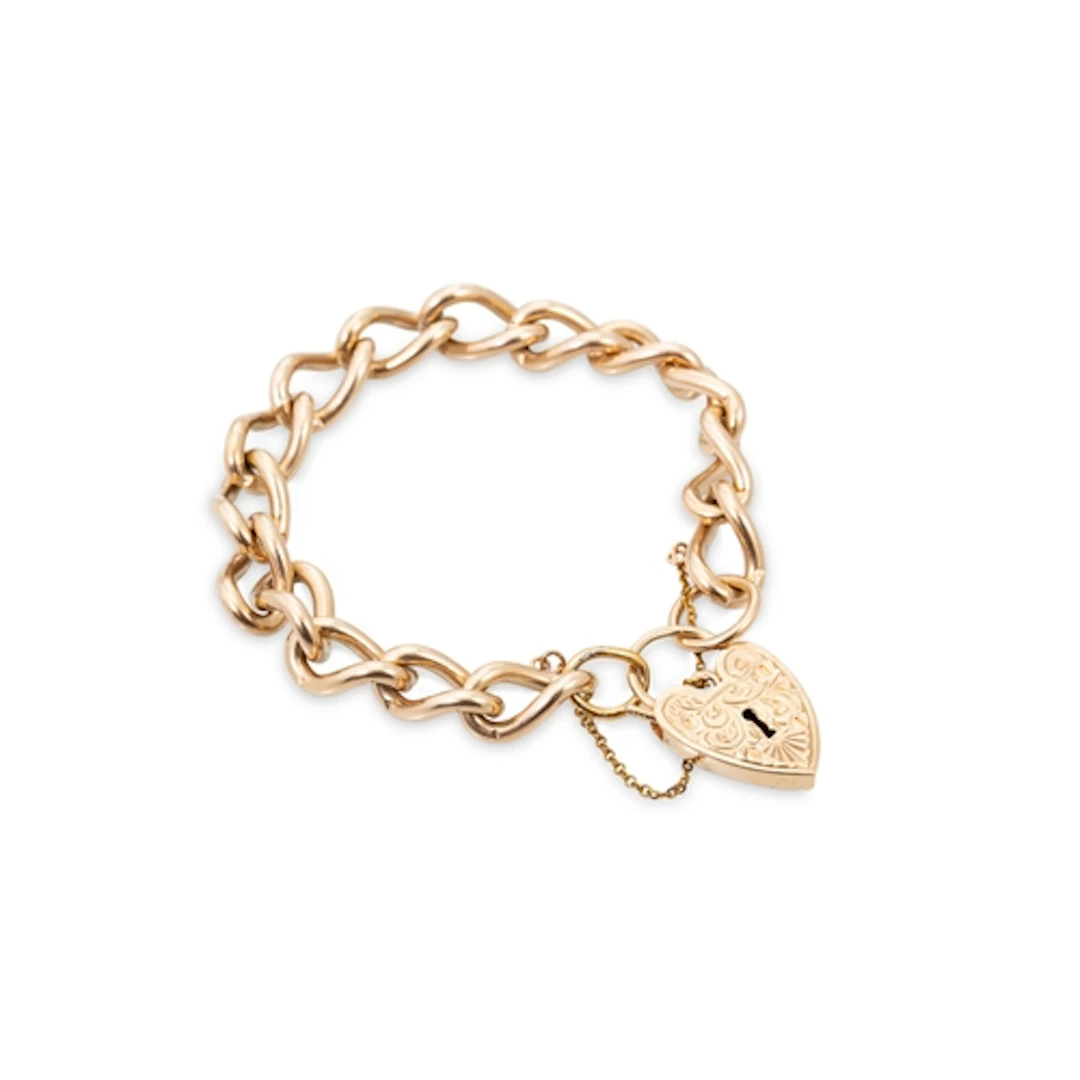 AN ANTIQUE 9CT GOLD CURB LINK BRACELET, with padlock clasp, ...