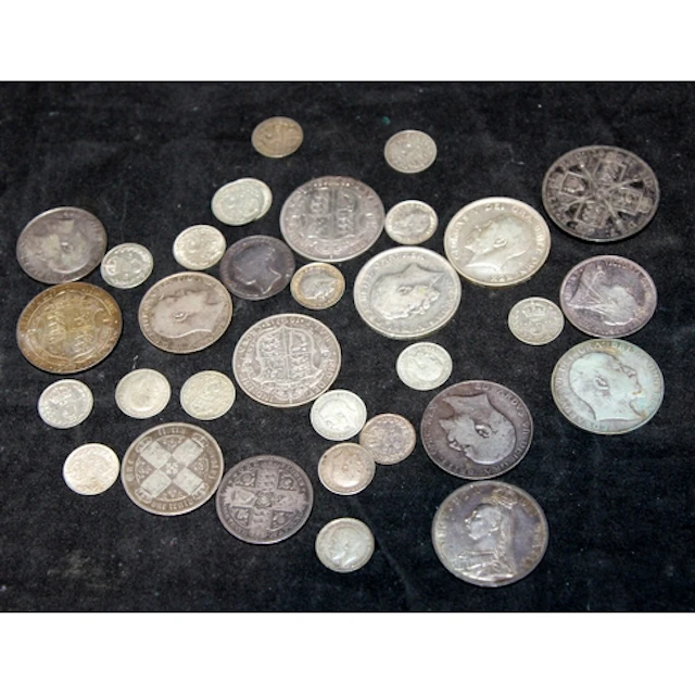 A collection of pre 1919 sterling silver GB coins. 220g