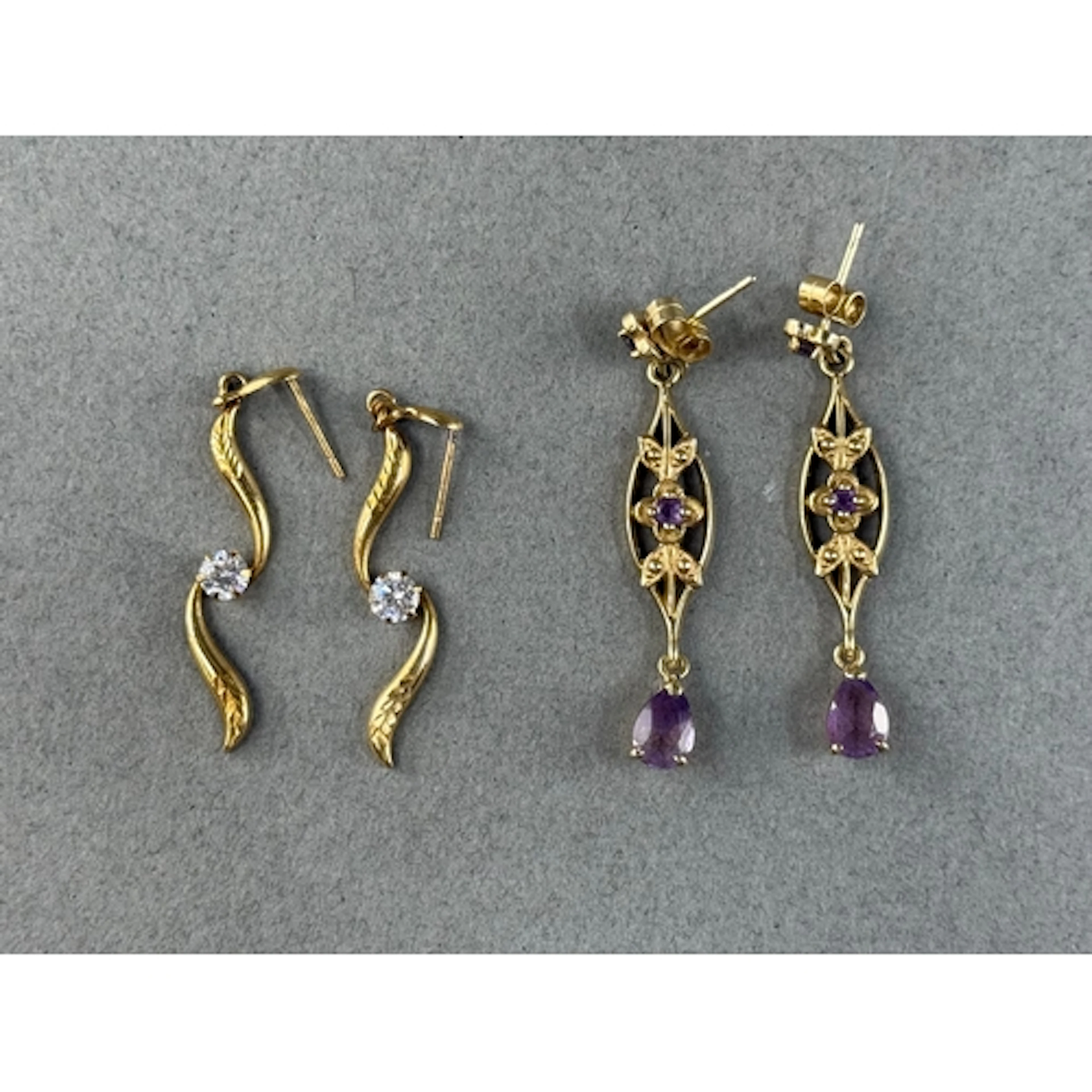 Jewellery- Pair of 9 ct gold long earrings set with Amethyst...