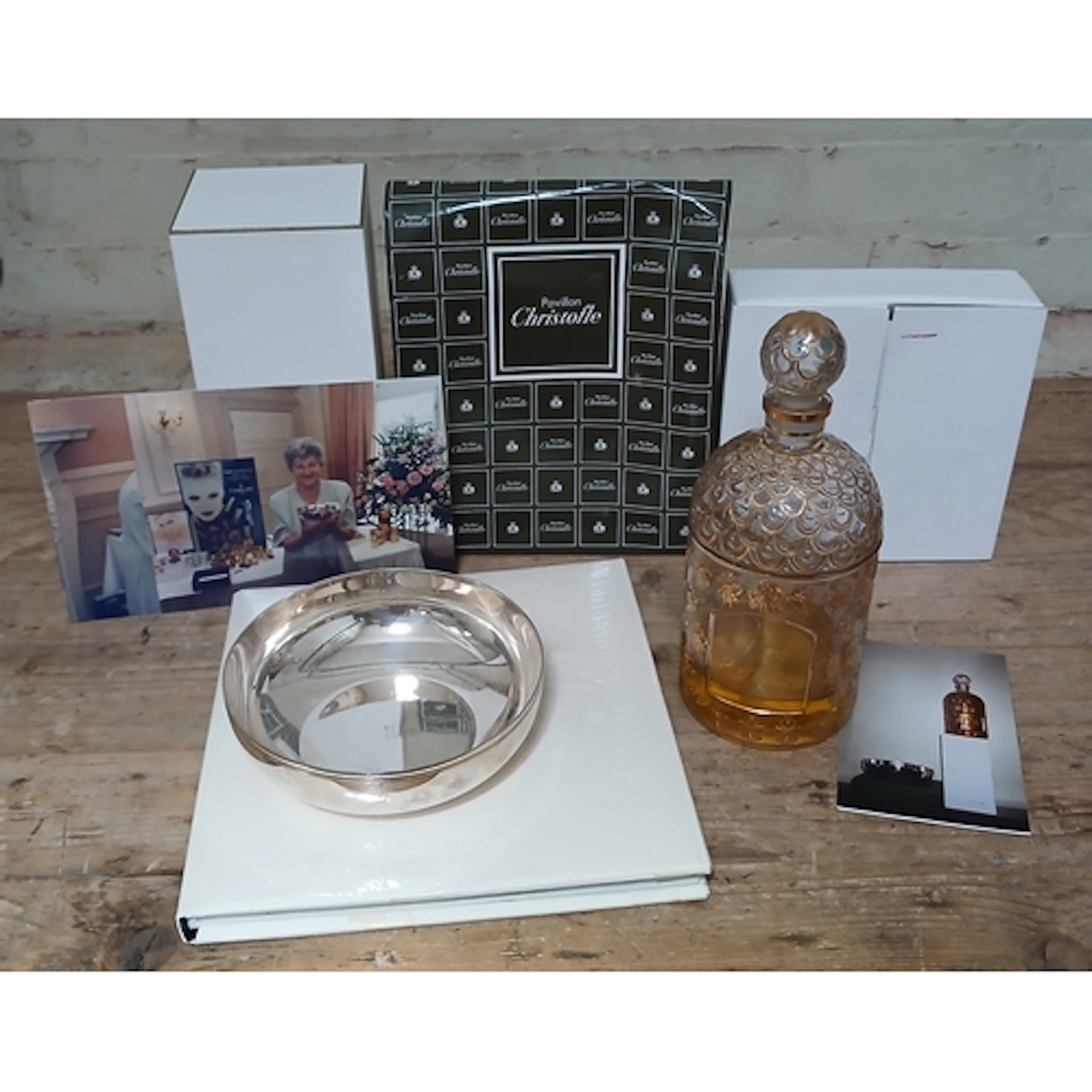 Guerlain, a large Mitsouko perfume bottle with partial conte...