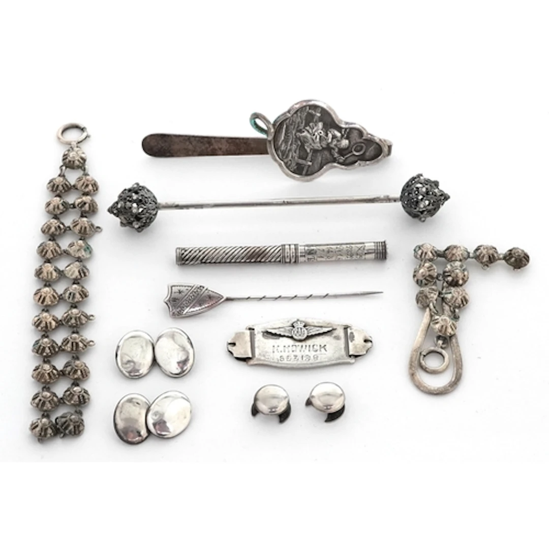 Antique and later silver including a stickpin, a continental...