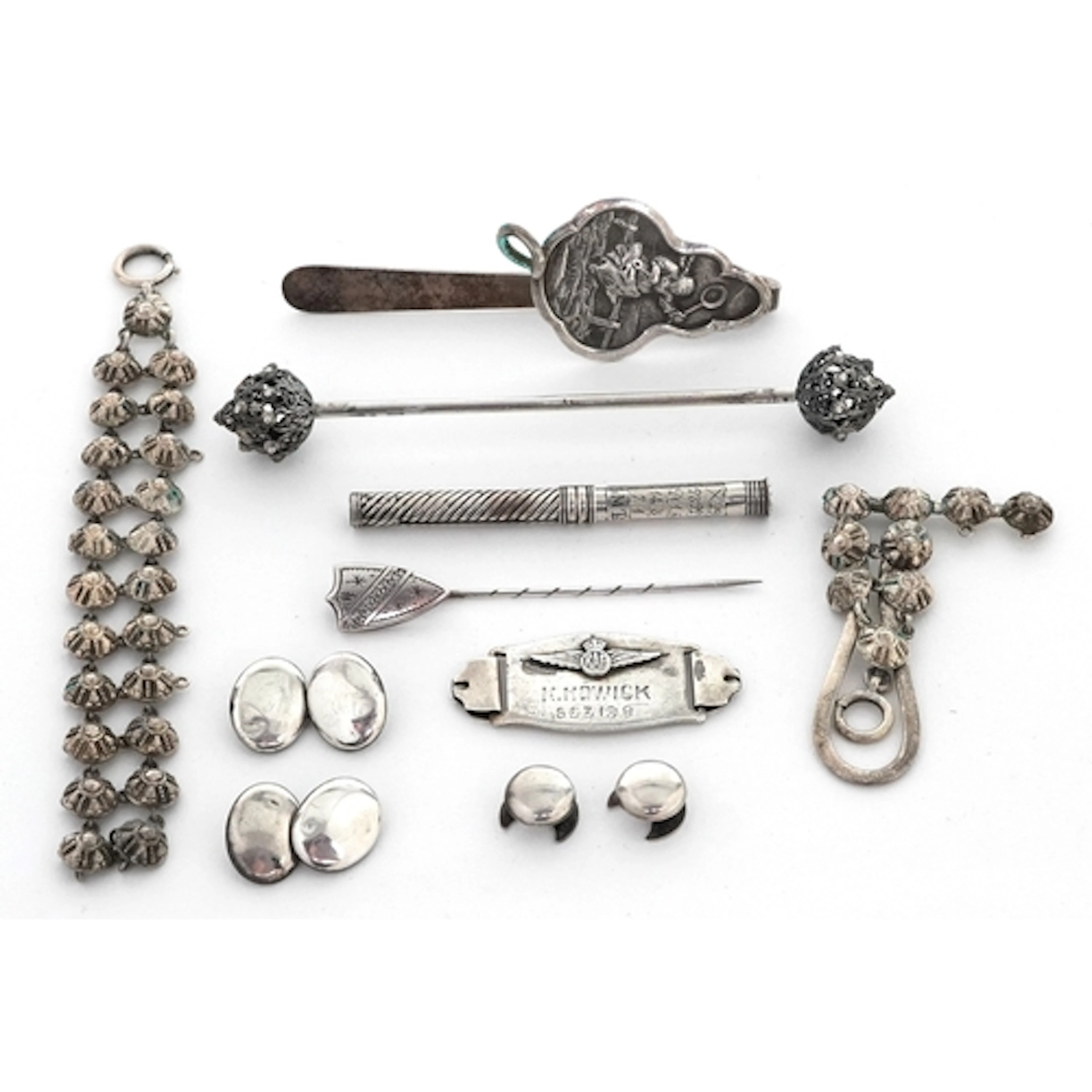 Antique and later silver including a stickpin, a continental...