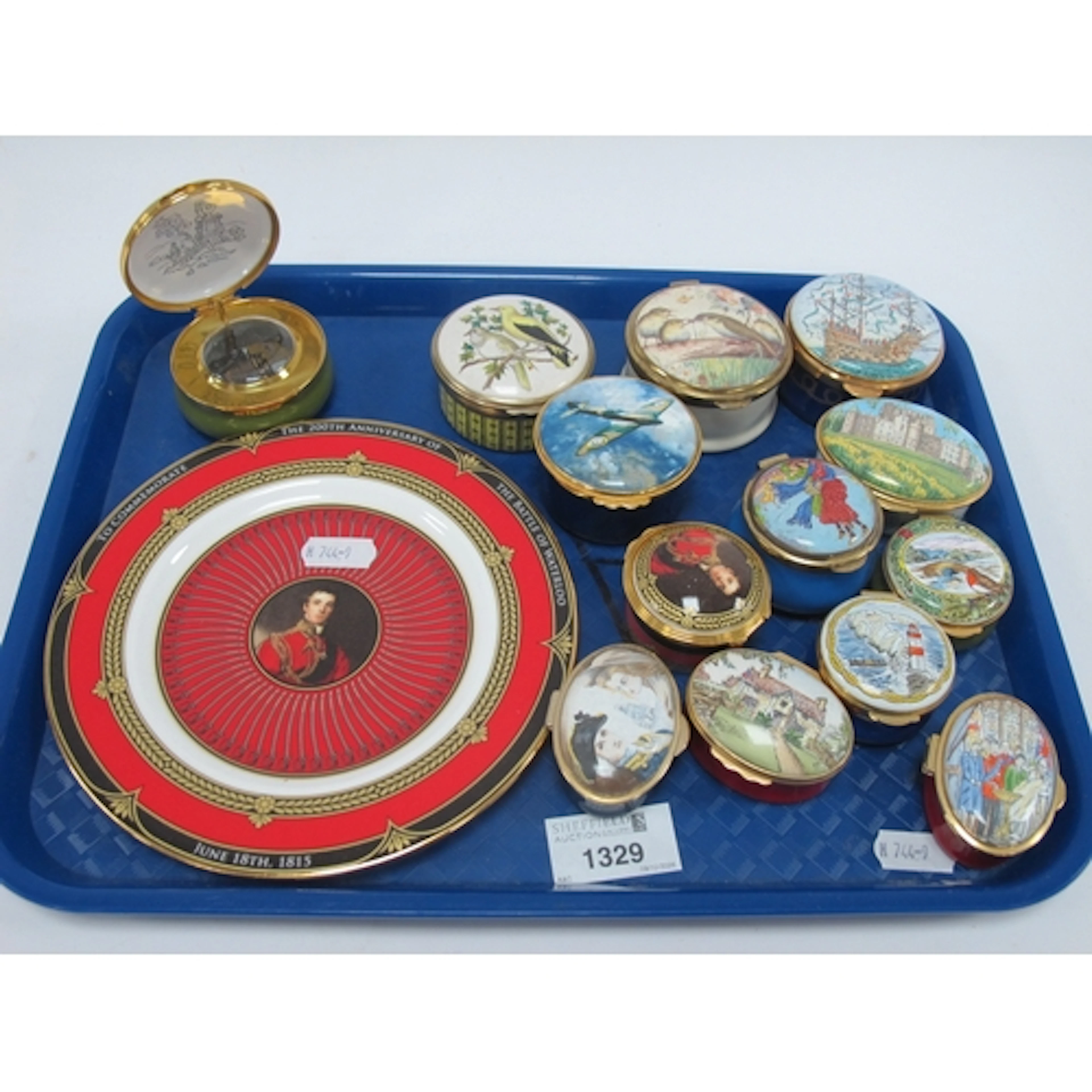 Thirteen enamel and porcelain trinket boxes, including Halcy...